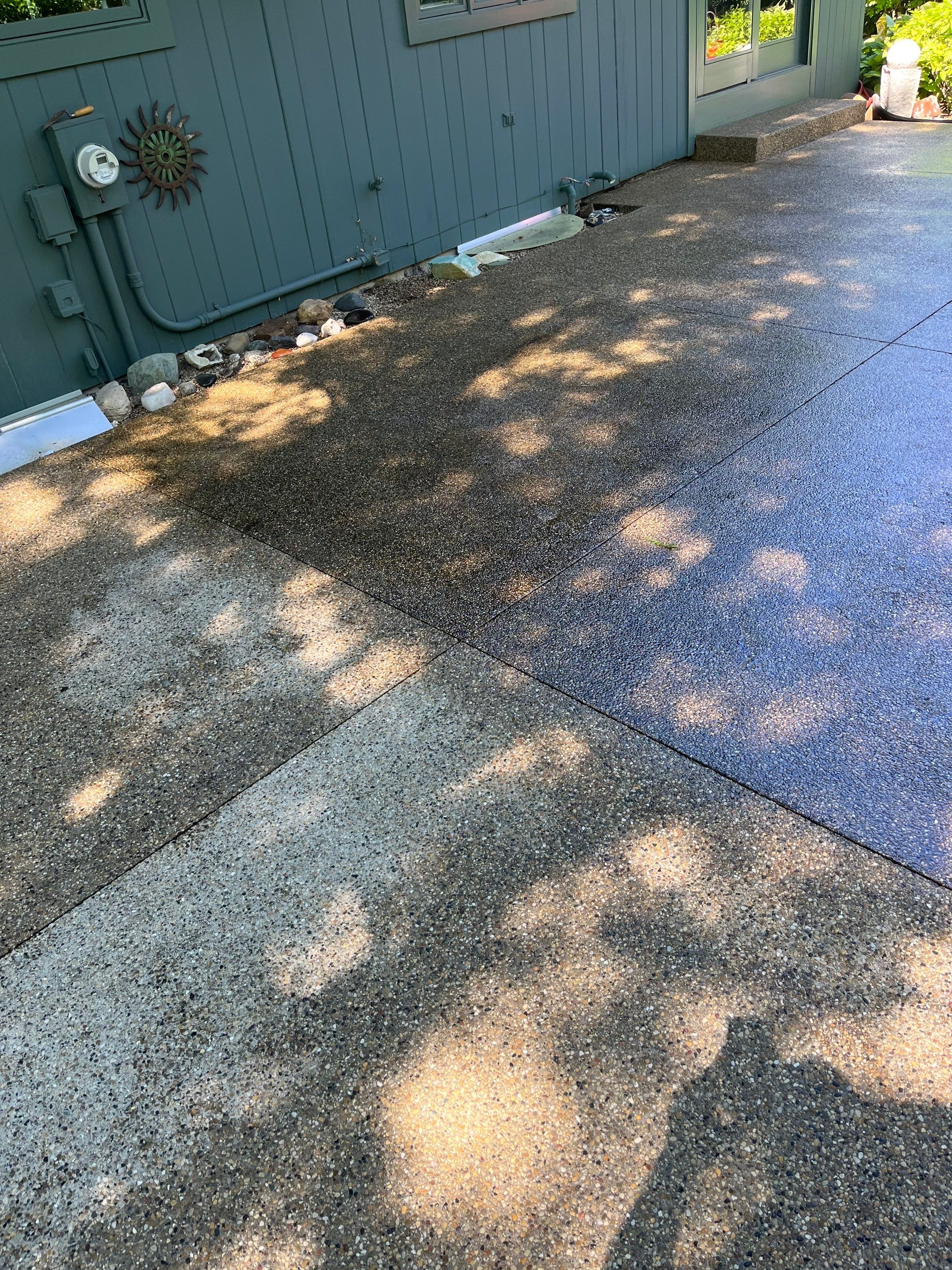 Aggregate concrete cleaning and sealing using Surebond SB-9000 by Northern Power Washing LLC.