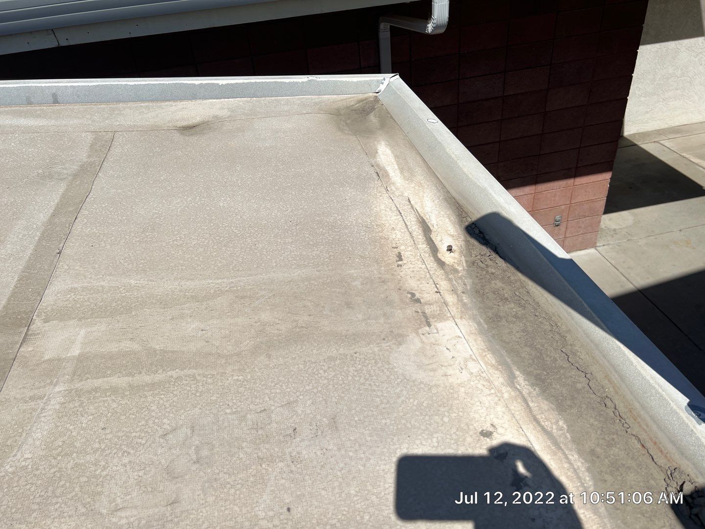 MR Roofing system using Benchmark/PUMA XL coatings over TPO single-ply roofing by Straight Edge Roofing Inc