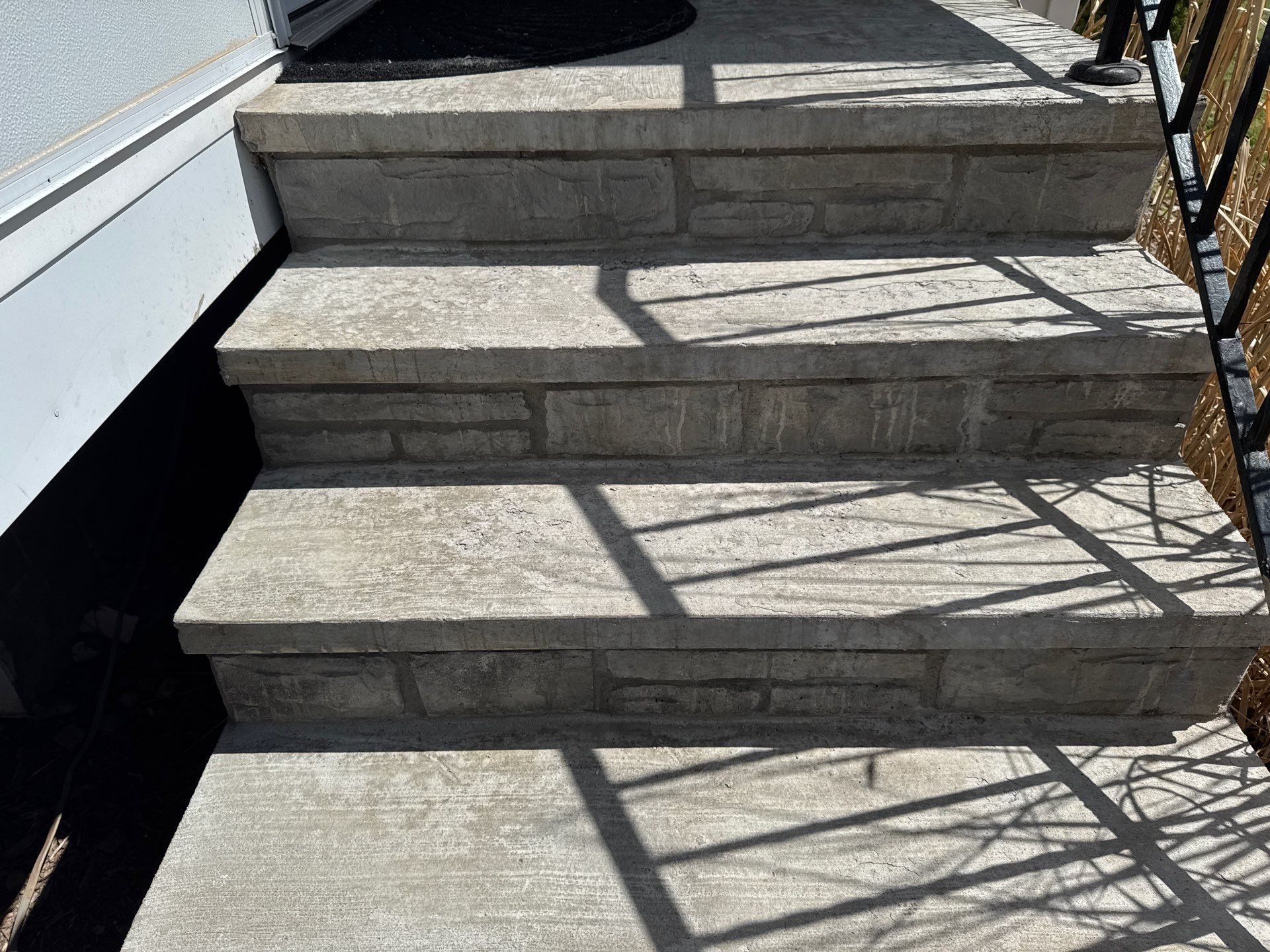 Silverado porch and steps coating by NG Masonry & Construction LLC