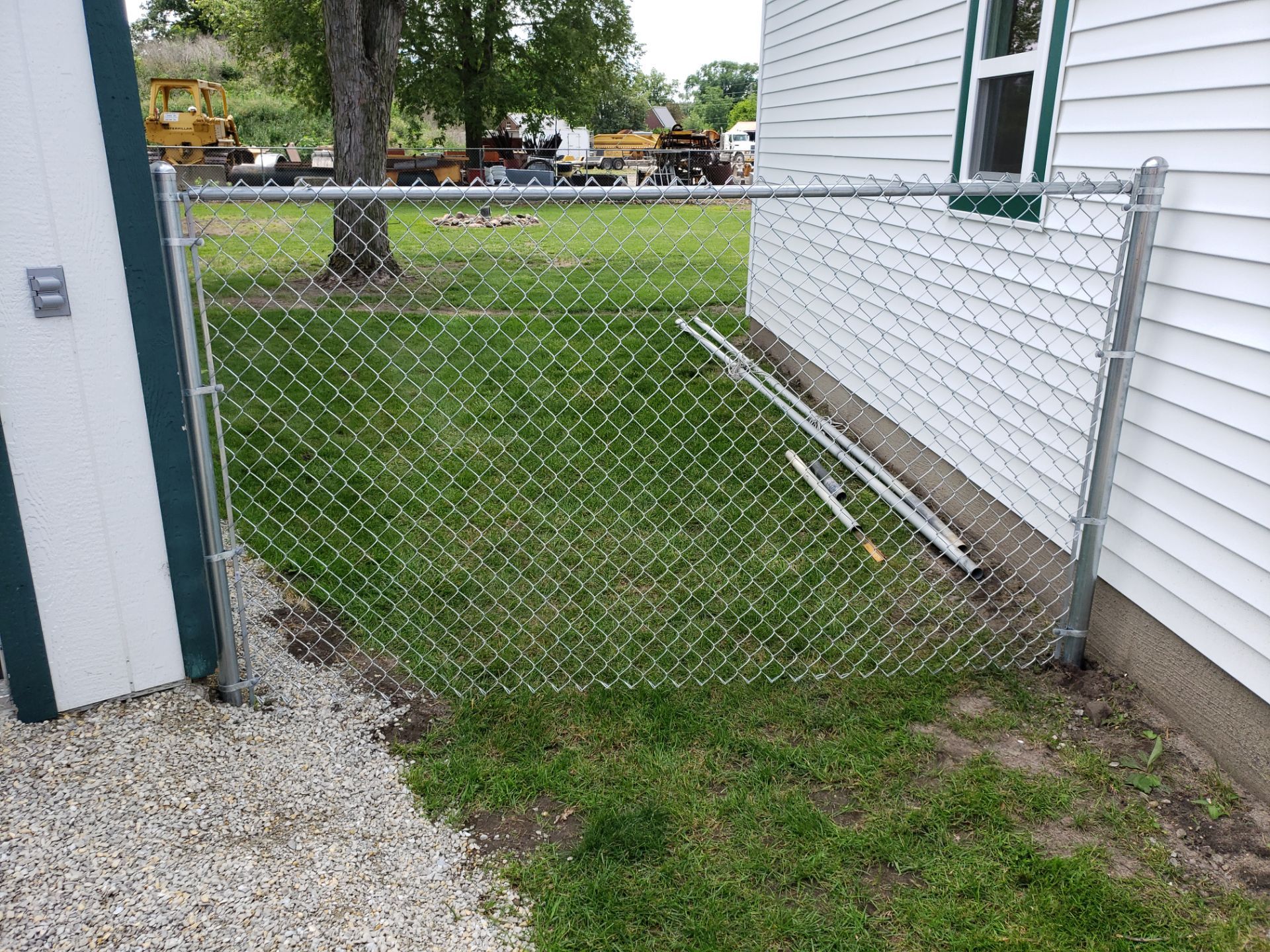 Residential Chain Link Fence and Gate Installation in Washburn by Perfect Picket Fence and Stain