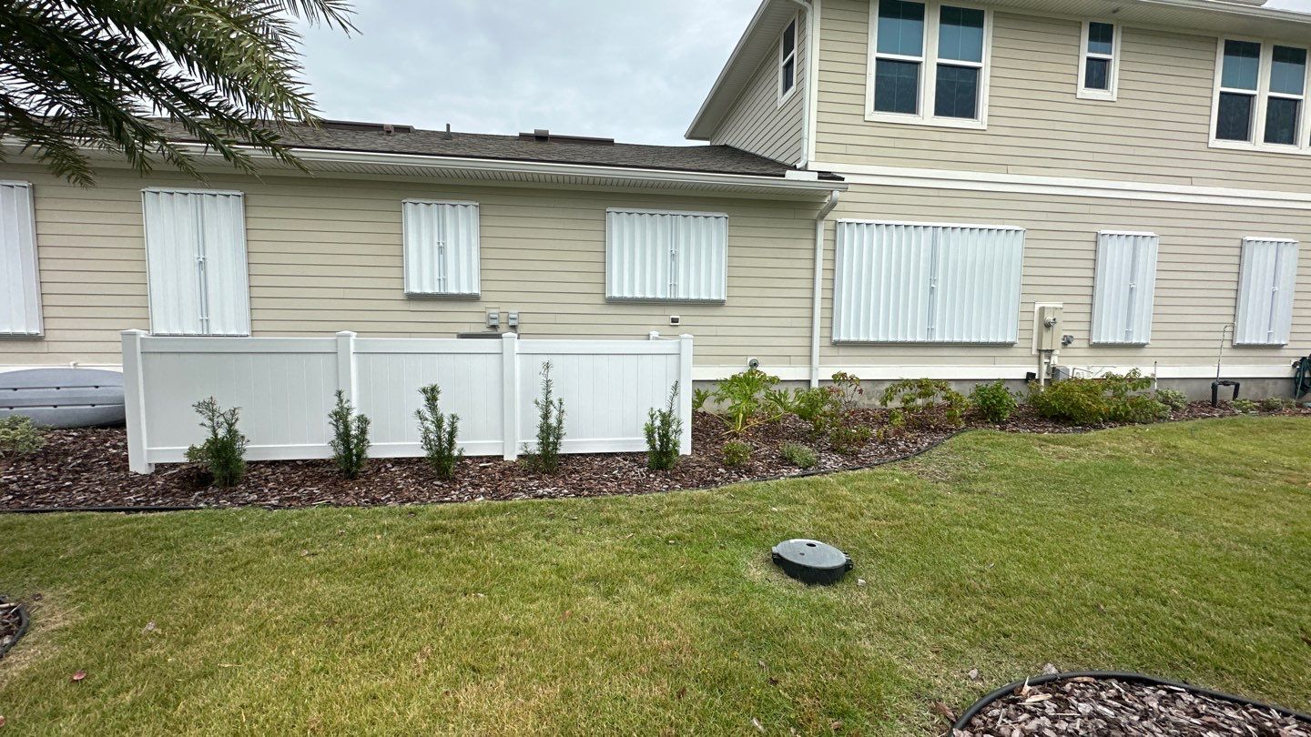 Hurricane Shutters using Accordions in White by Smart Guard Shutters