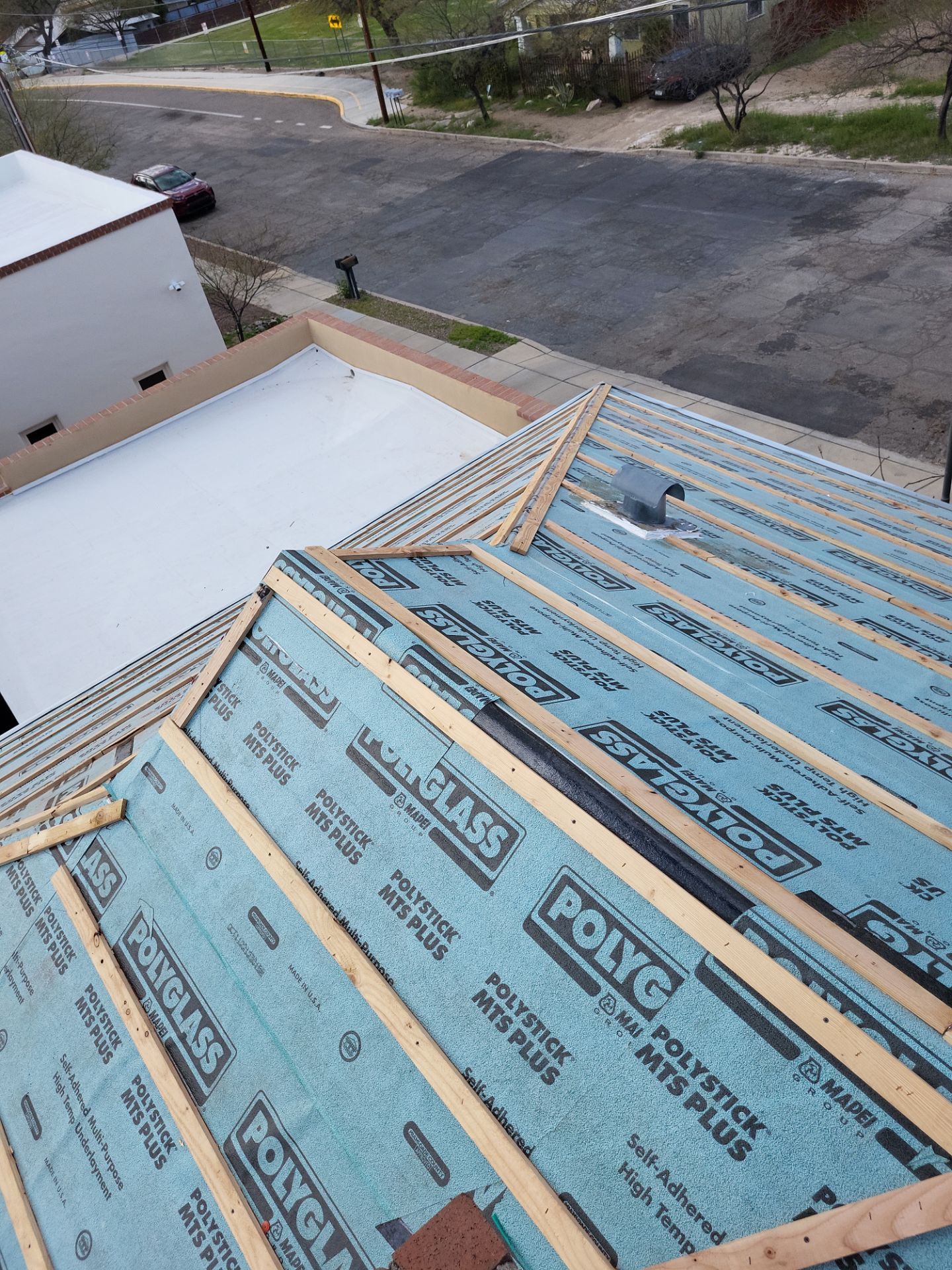 Metallic Silver Exposed Fastener by Reimagine Roofing