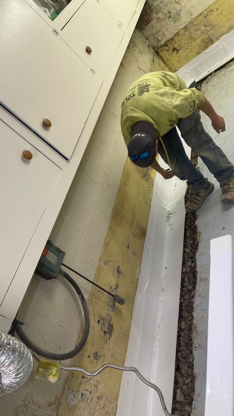 Interior Waterproofing Using GrateDrain™ Products by Toledo Basement Repair