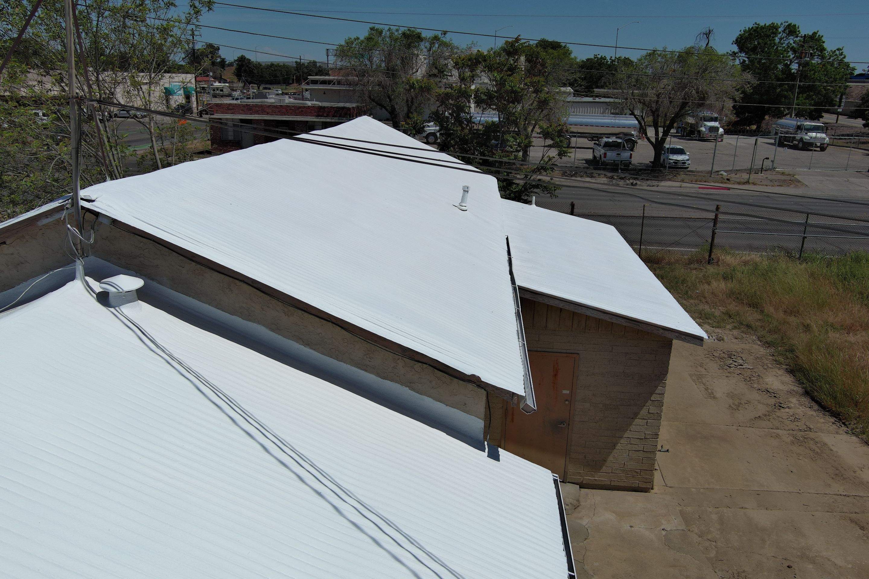 Spray foam and coatings using Conklin Benchmark/PUMA XL by Straight Edge Roofing Inc