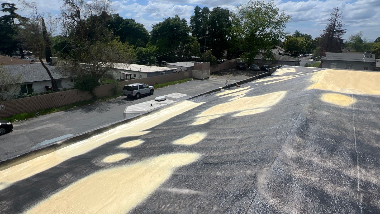 Foam Refurbish using Conklin Benchmark/PUMA XL coatings and spray foam by Straight Edge Roofing Inc