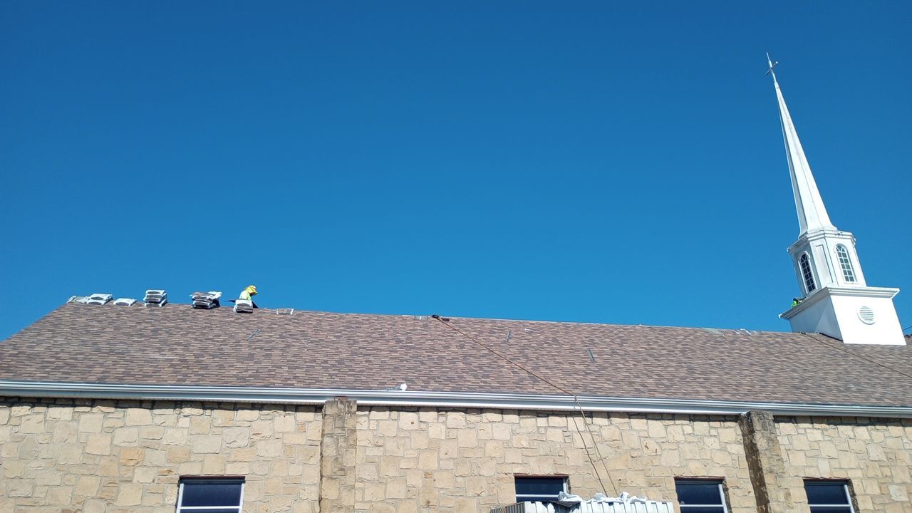 Commercial Roofing Installation using Performance Shingles by Mr. Roofer