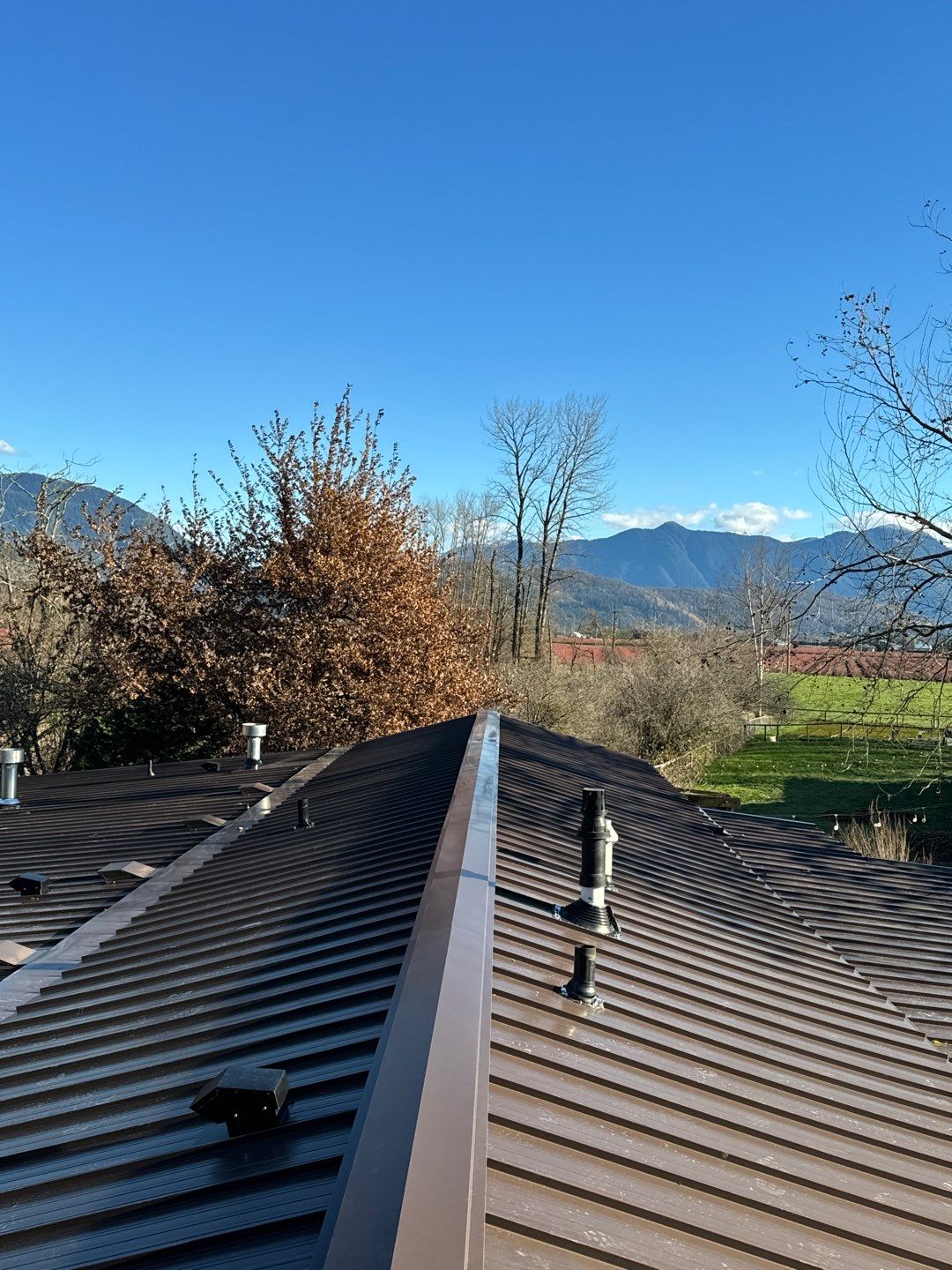 Residential Roofing Installation using 12" Prolok metal  by Top Notch Roofing Inc