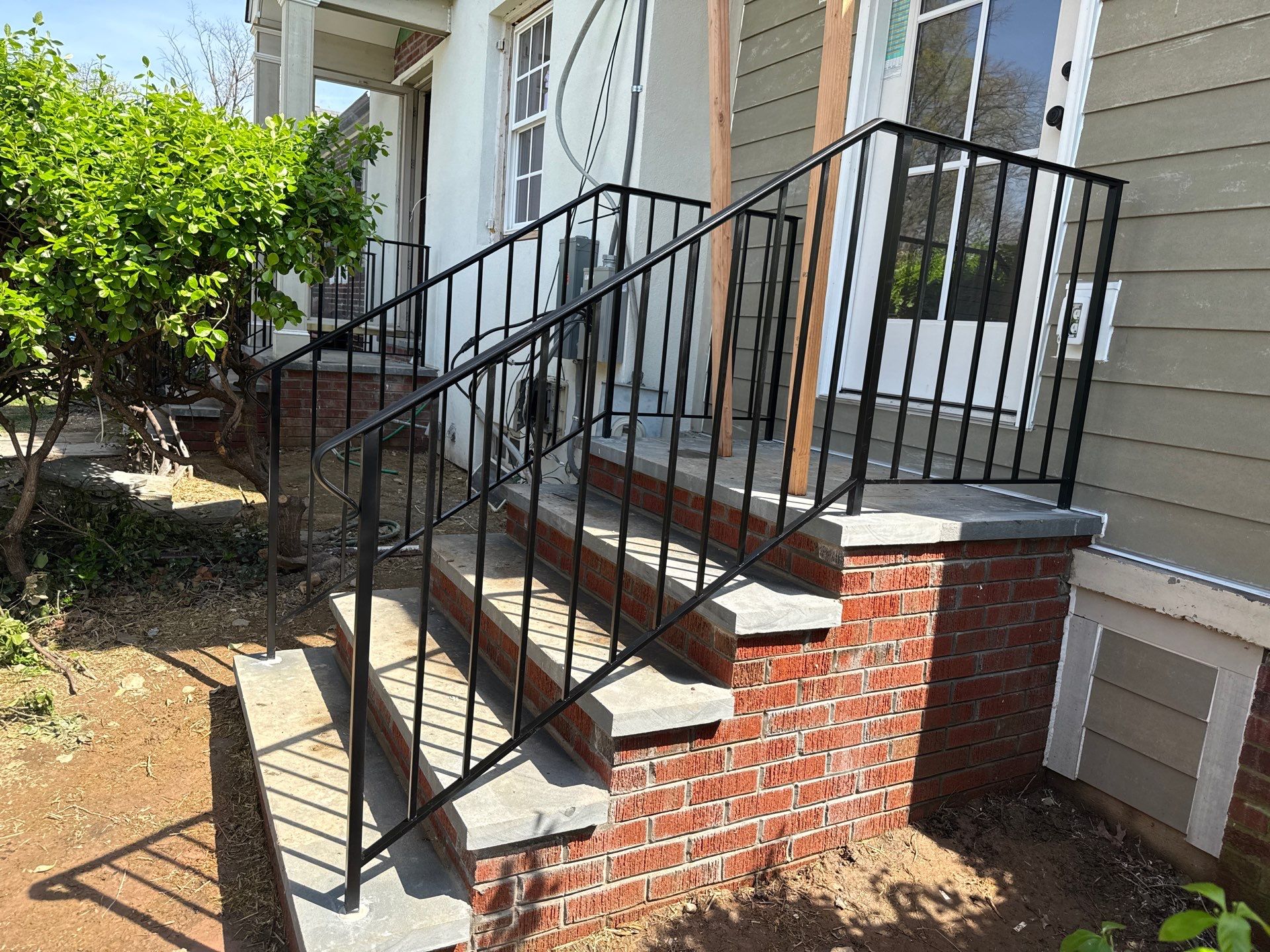 Custom Brick Step and Metal Railing Installation in Silver Spring by Capitol Iron Works