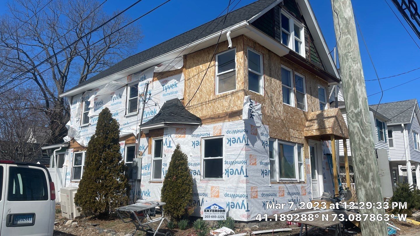 Siding Installation using Hardie Plank Aged Pewter by A Plus Exterior