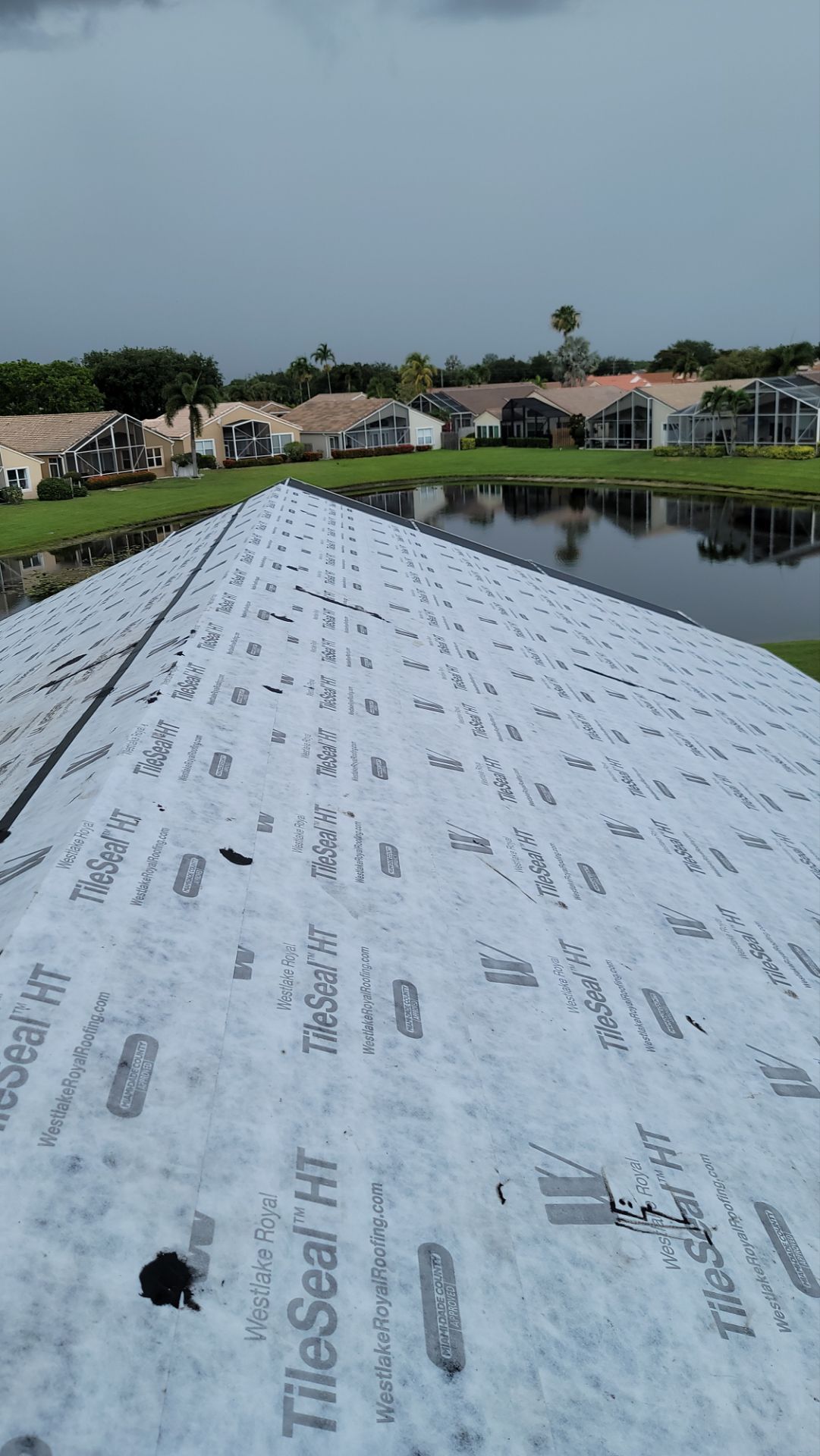 New Barrel Tile Roof Installation and Decking Repair in Boynton Beach by Aastro Roofing