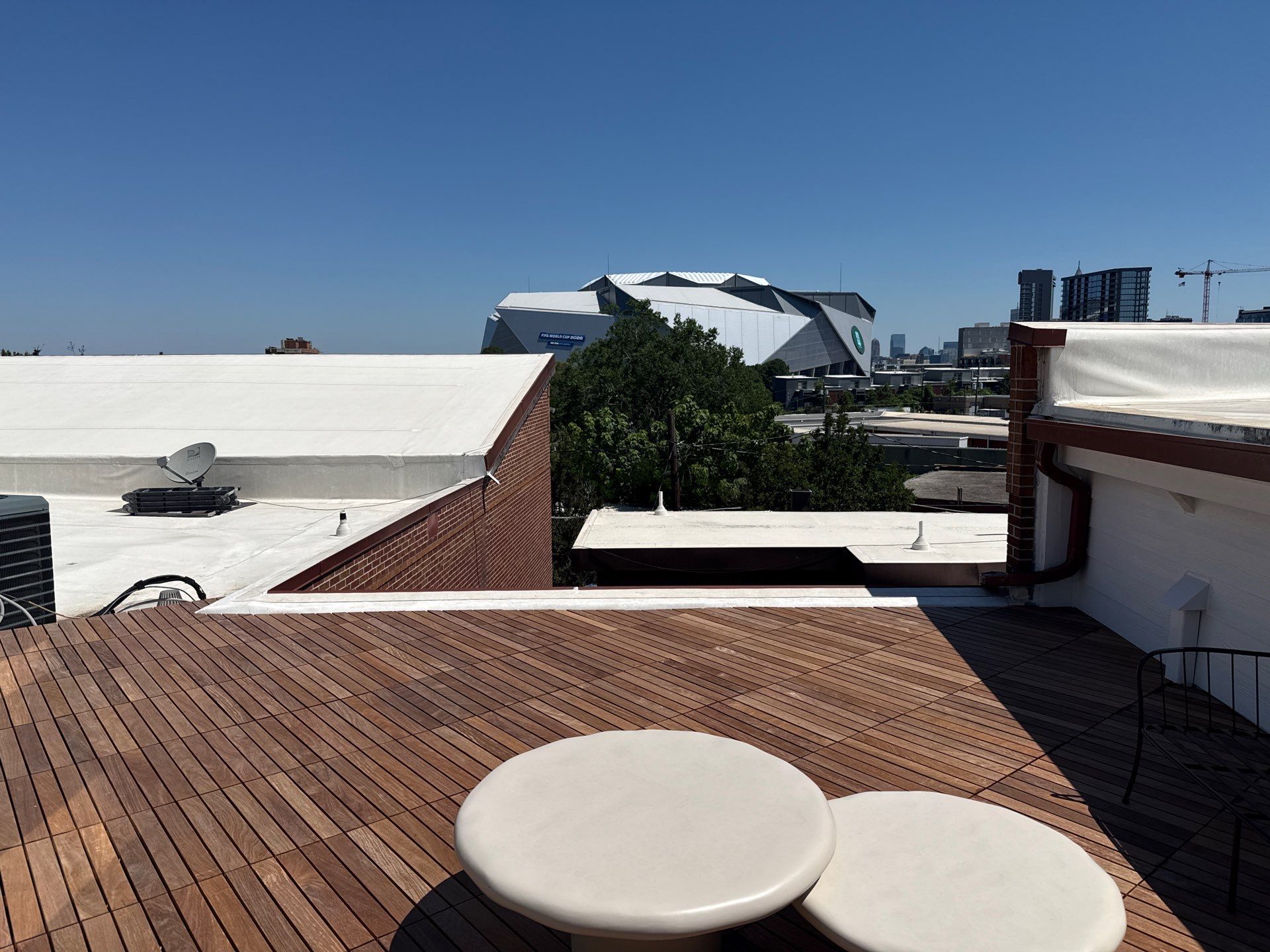 Atlanta Rooftop Deck Renovation with Modular Wood Slat Tiles by Swift Home Renovations