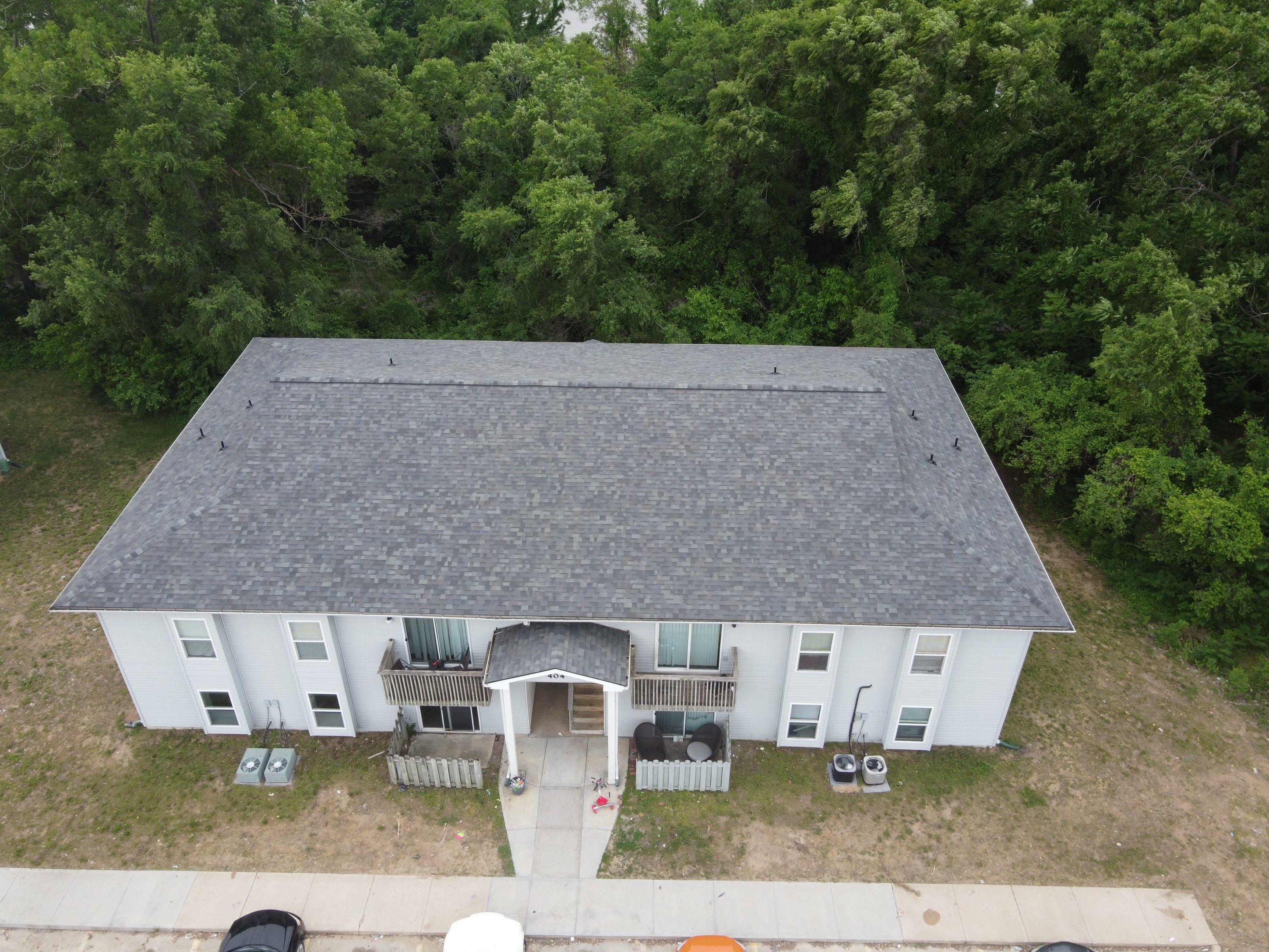 Multifamliy Complex ROOF REPLACEMNT with Ventilation Upgrades using Malarkey Vista Class III IR Shingles by Gorilla Exteriors Contracting, LLC