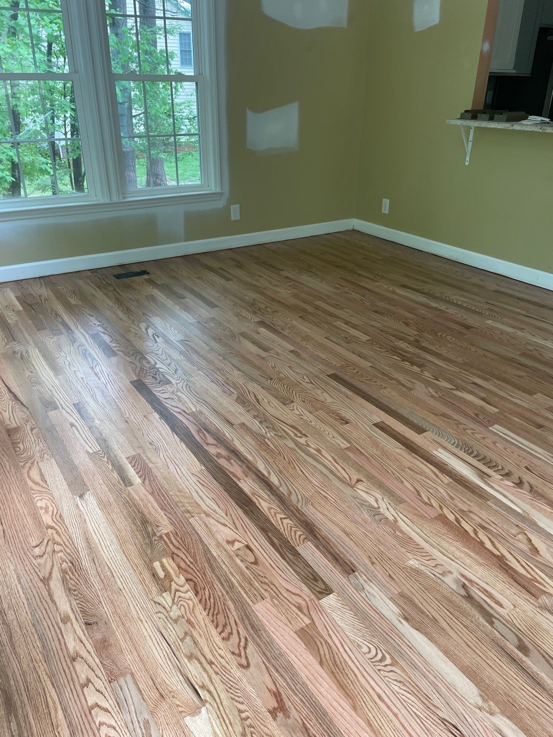 Red oak floor refinishing by Accent Custom Floors