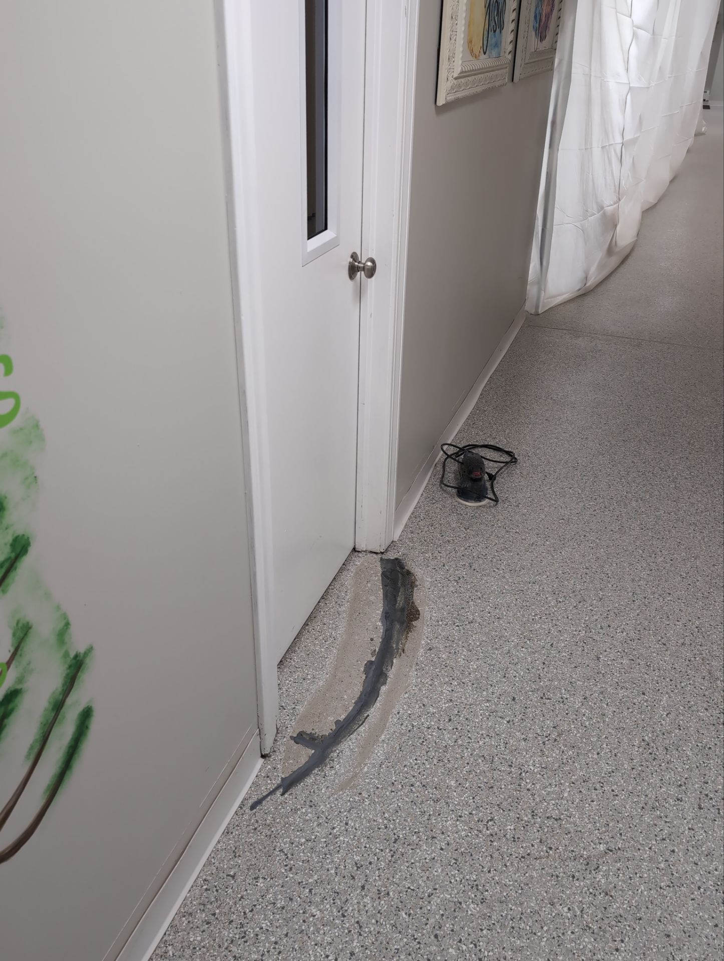 Medina Cracked basement floor with Epoxy by Beck Restoration Management Group