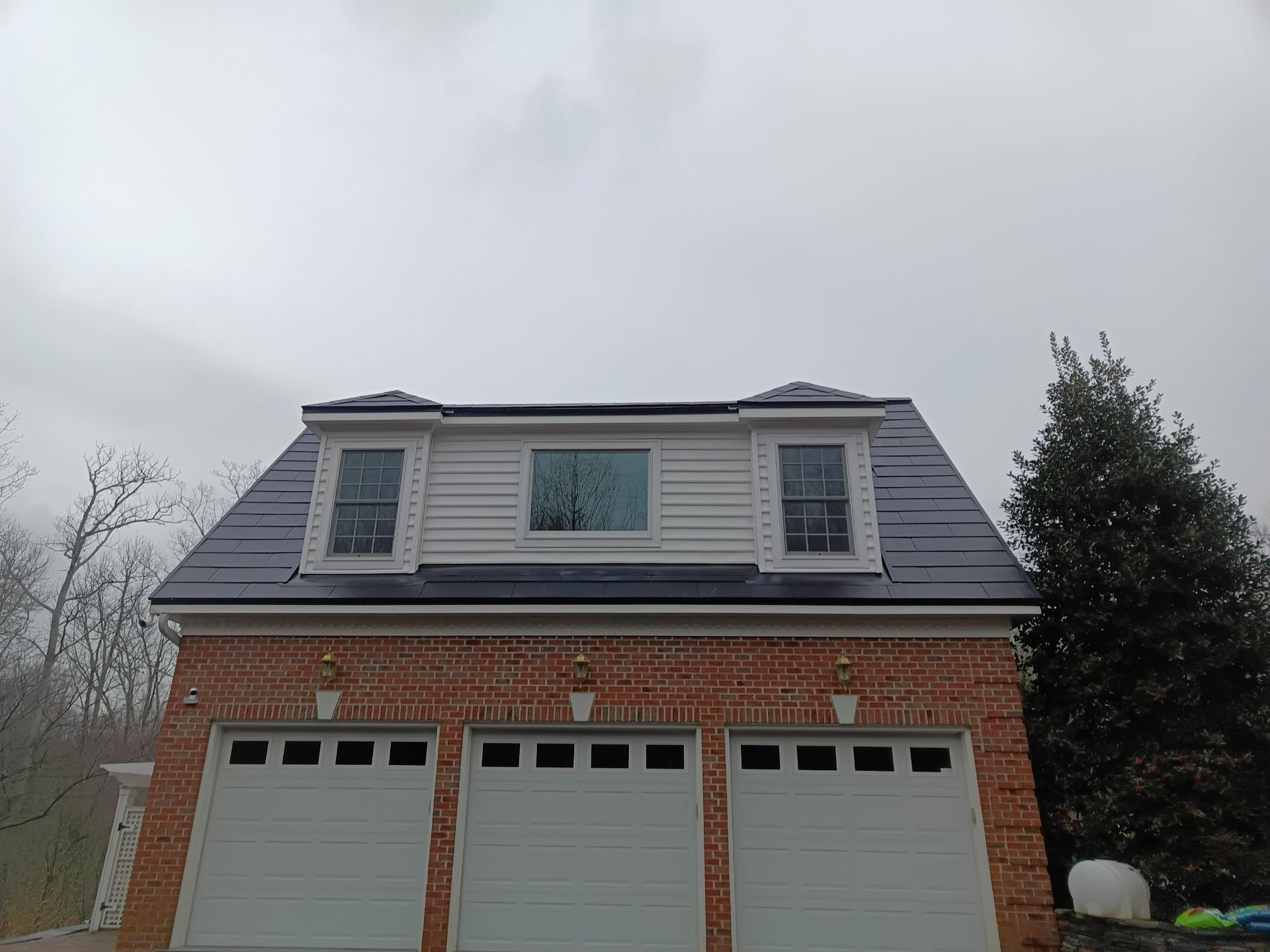Tesla Solar Roof Replacement  by American Home Contractors