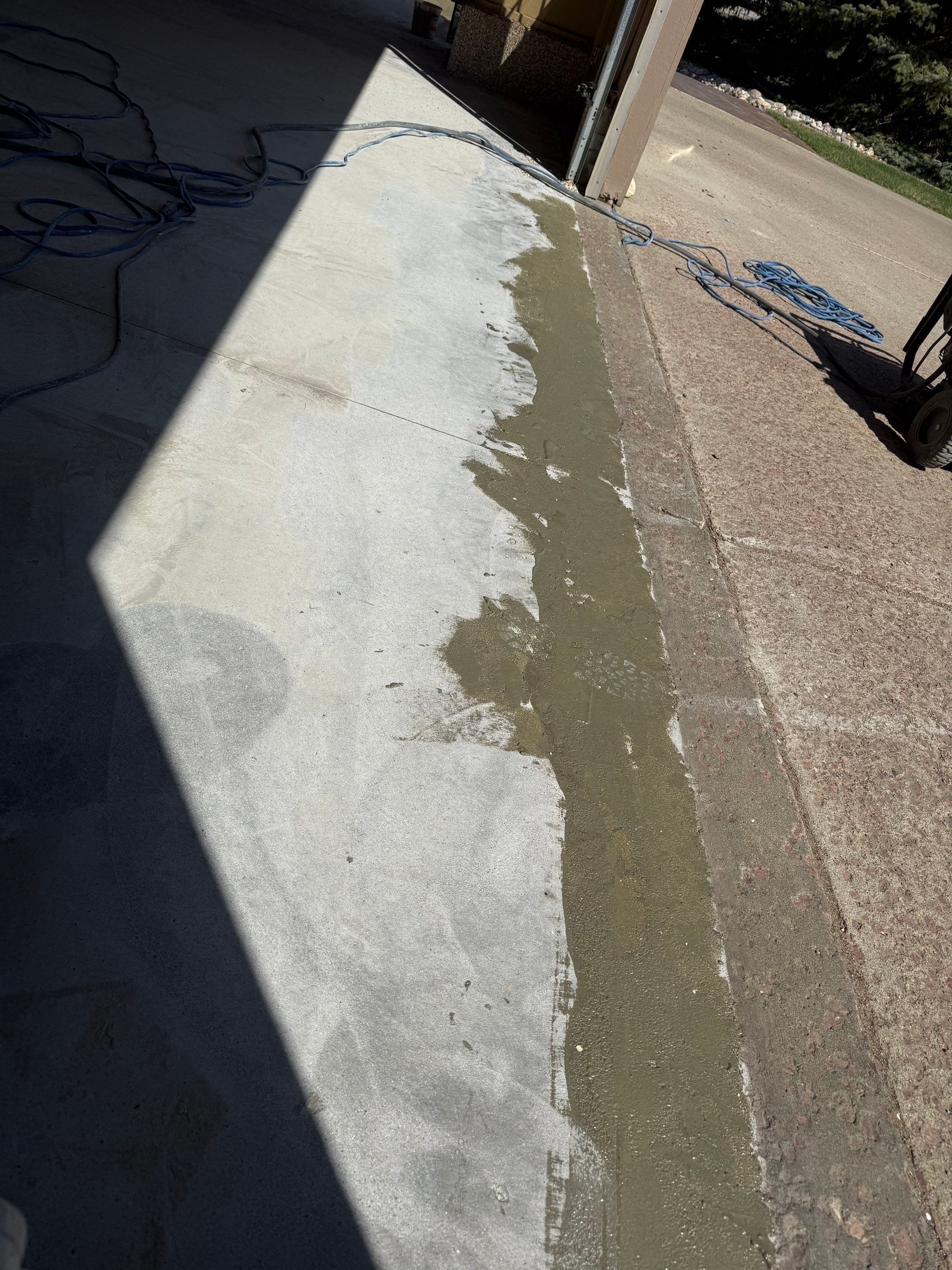 Residential Garage Floor Transformation with Speckled Epoxy Coating by Select Painting, Coatings & Garage Cabinets