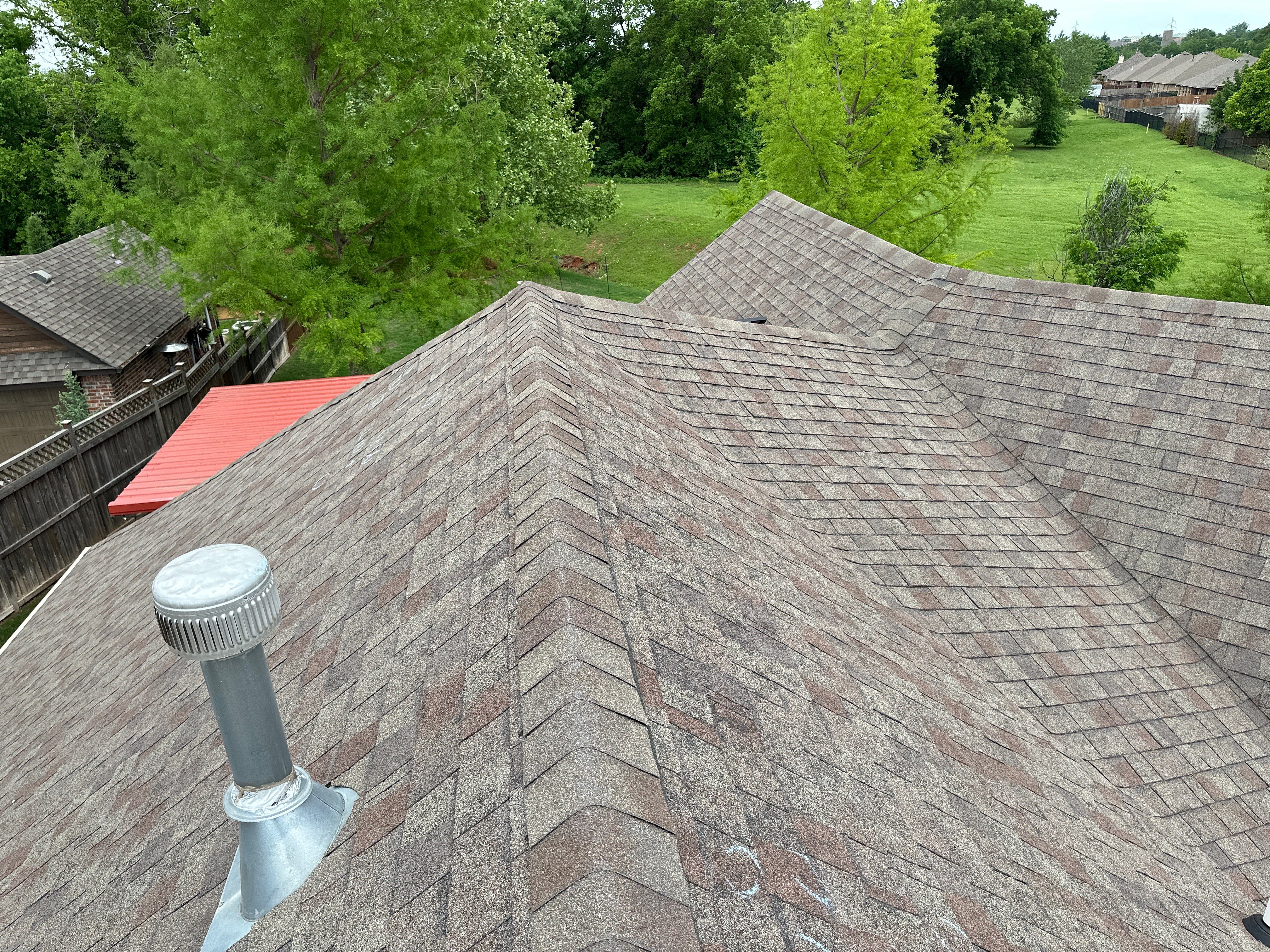 Reroof using Owens Corning Duration Storm IR in Driftwood by Castillo Roofing
