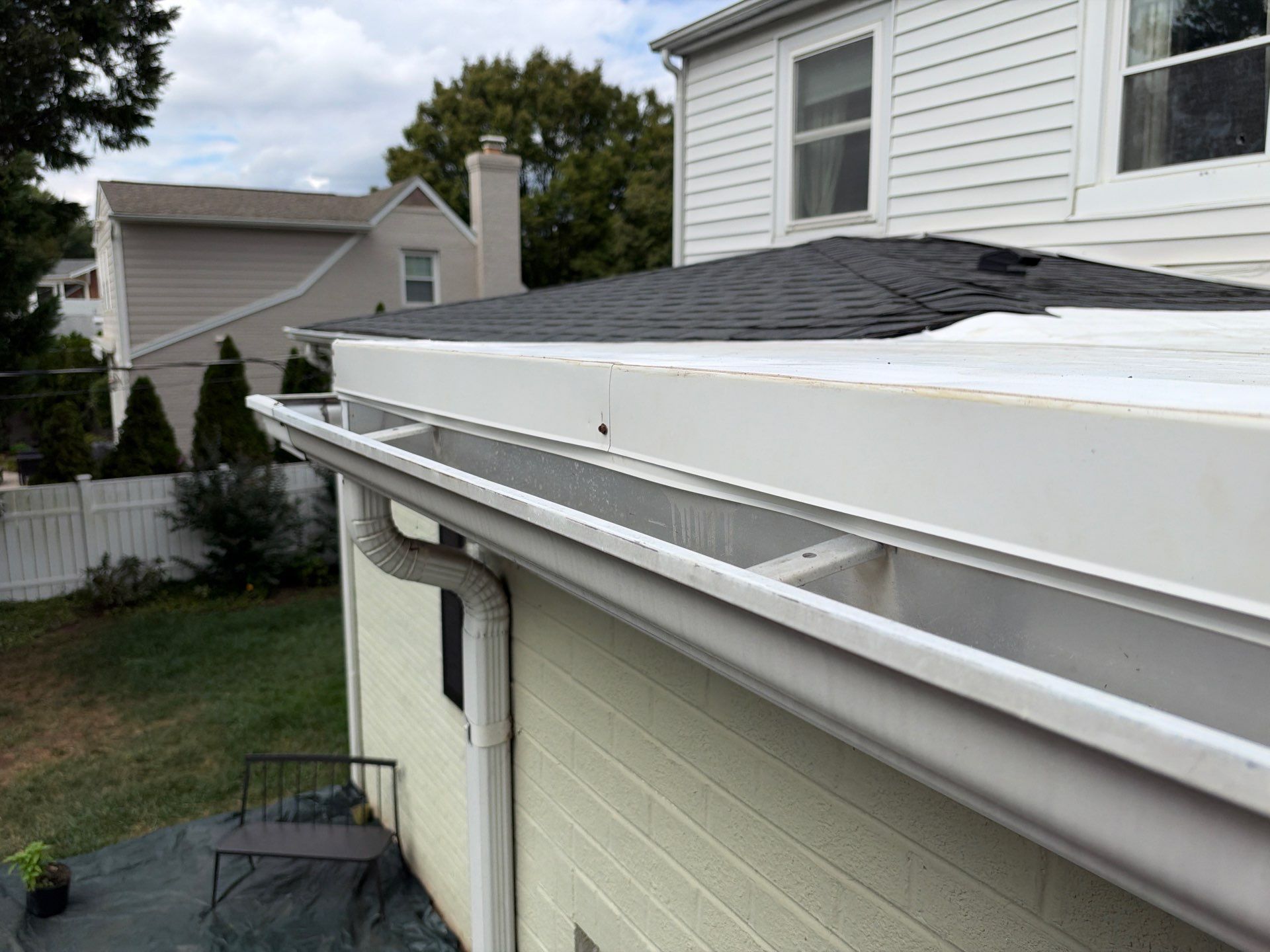 Richmond Roof Replacement Including Flat Membrane and Asphalt Shingles by Cade Construction