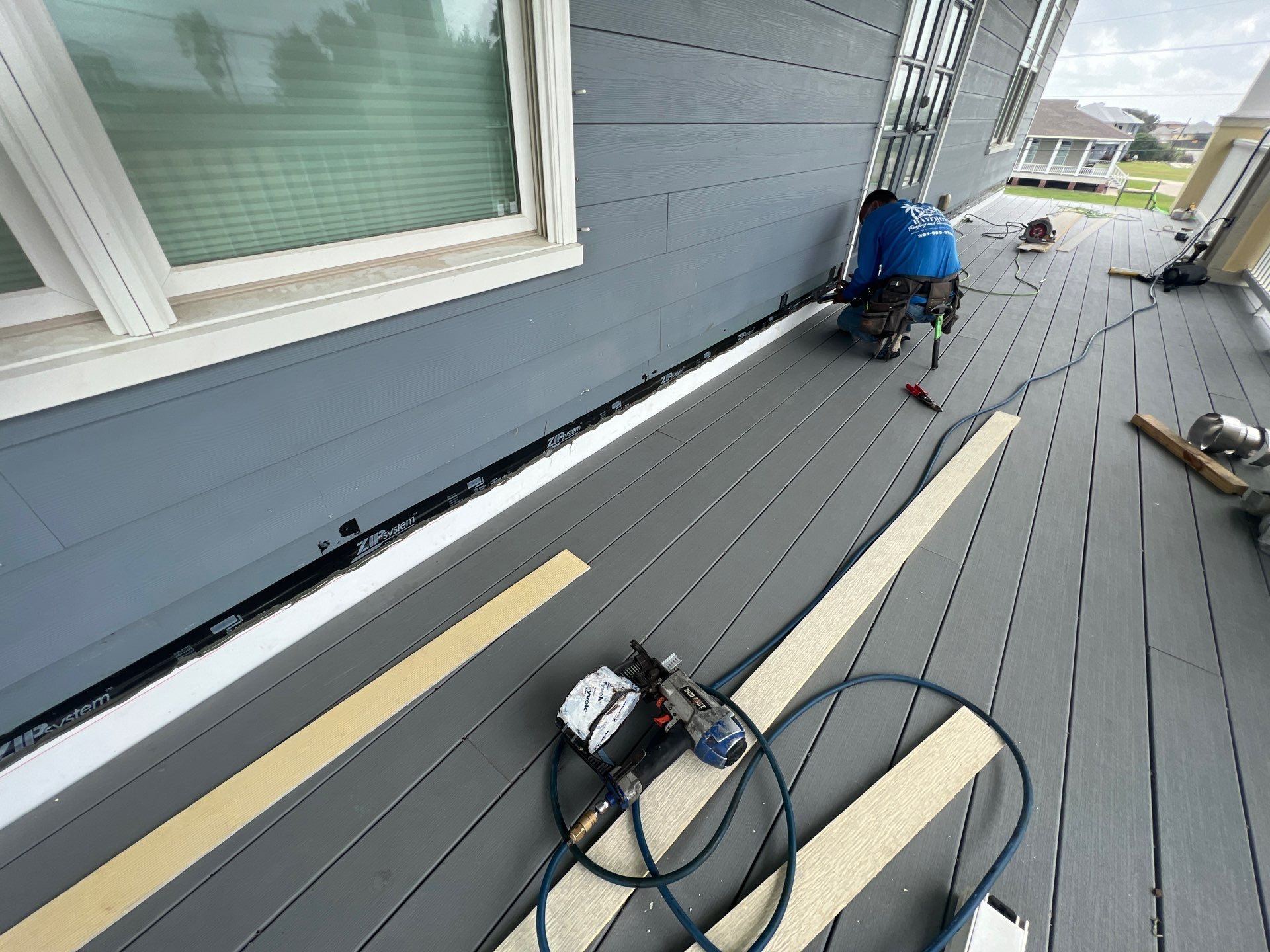 Walk Out Patio Cover by Bayfront Roofing and Construction