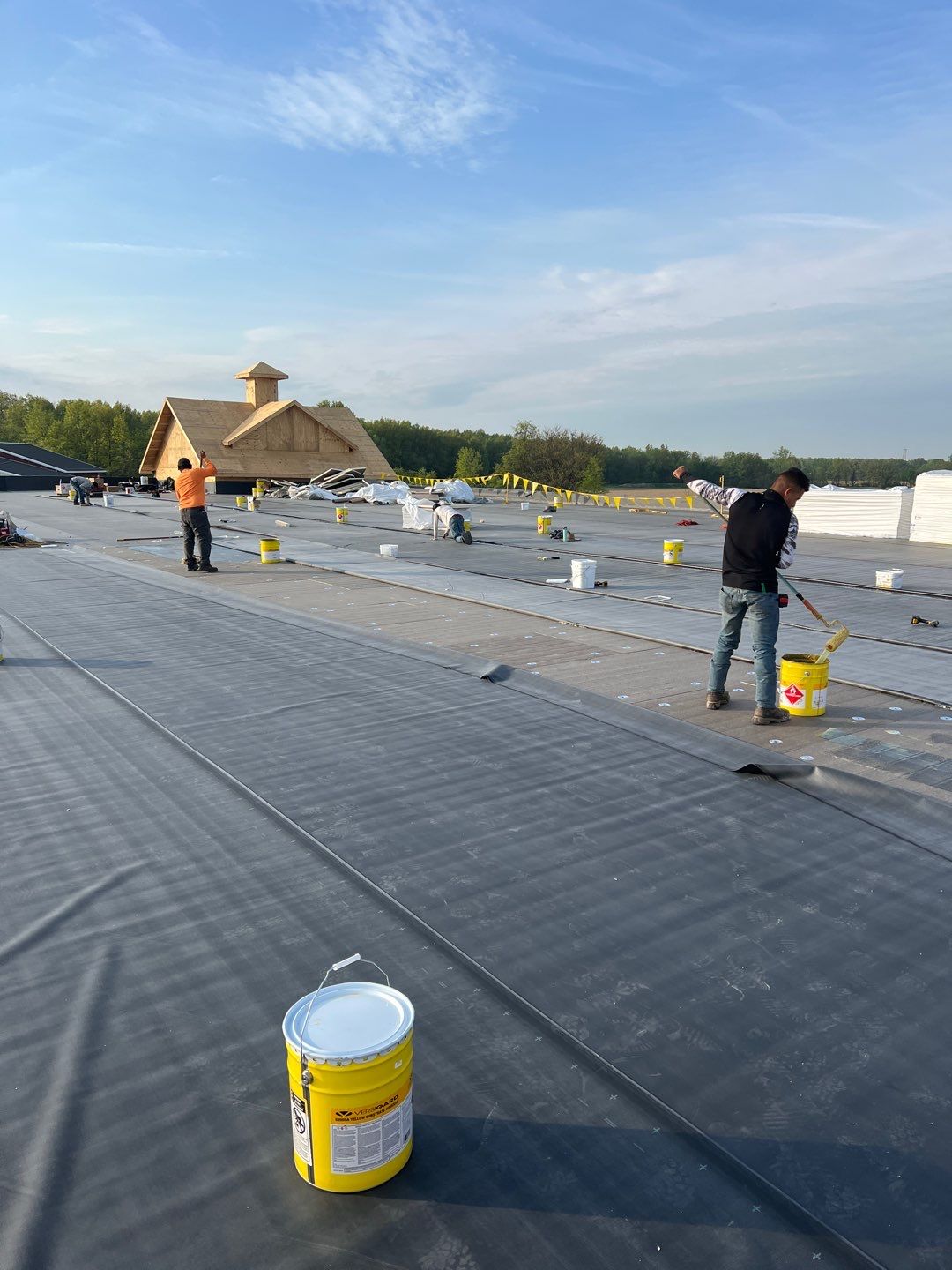 Commercial Roofing Installation using 60 mil rubber roof  by Nitro Roofing and Construction