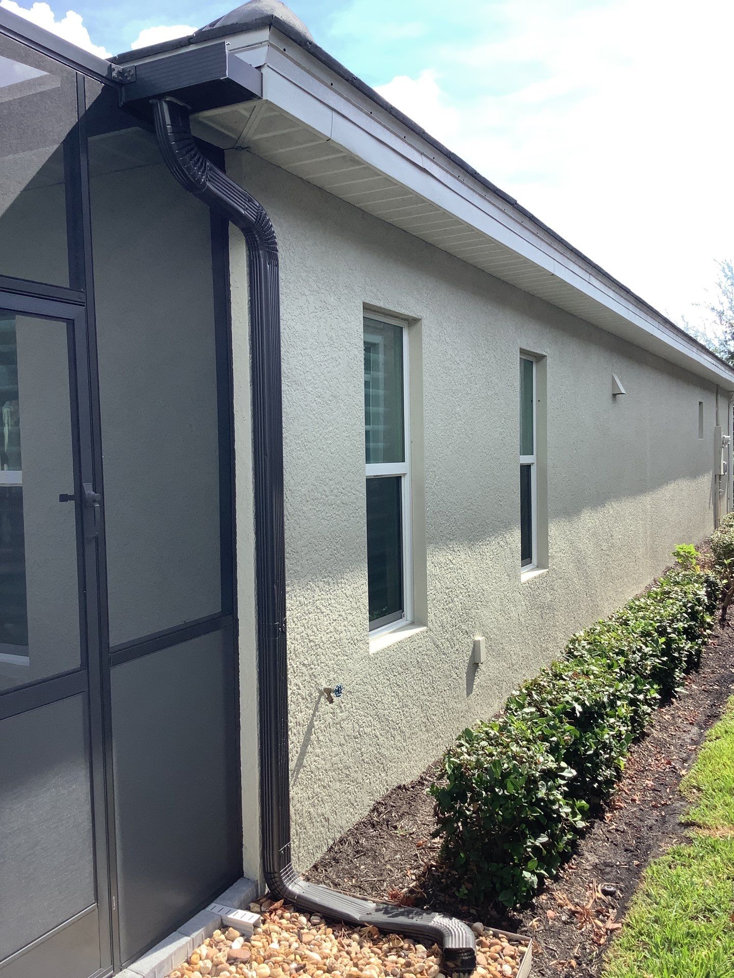 Splash Guard Gutters for Heavy Rain Areas in Fort Myers FL by Gutter Professors