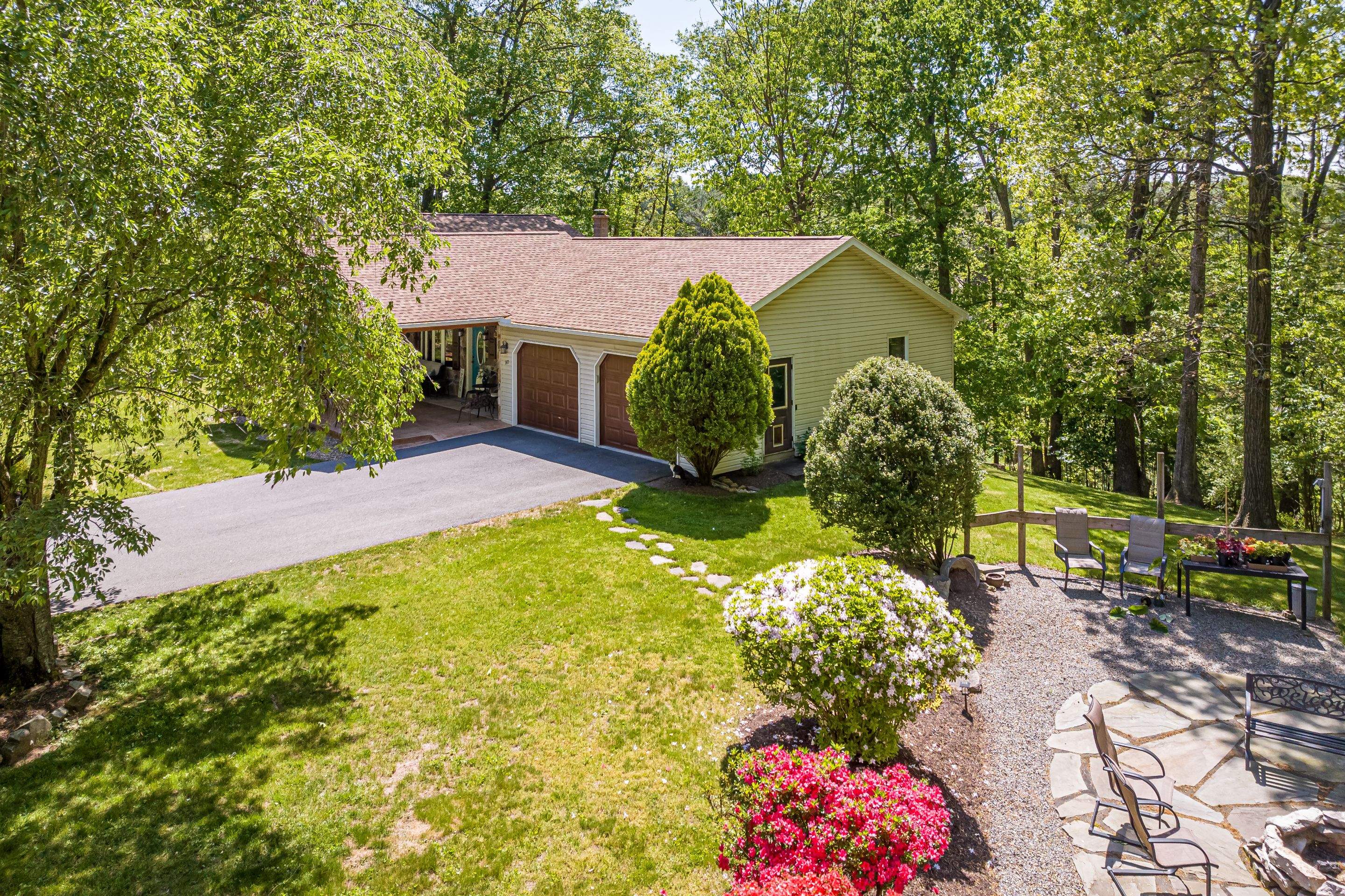 Reshingle-shakewood and timberframe patio roof by Esh Builders
