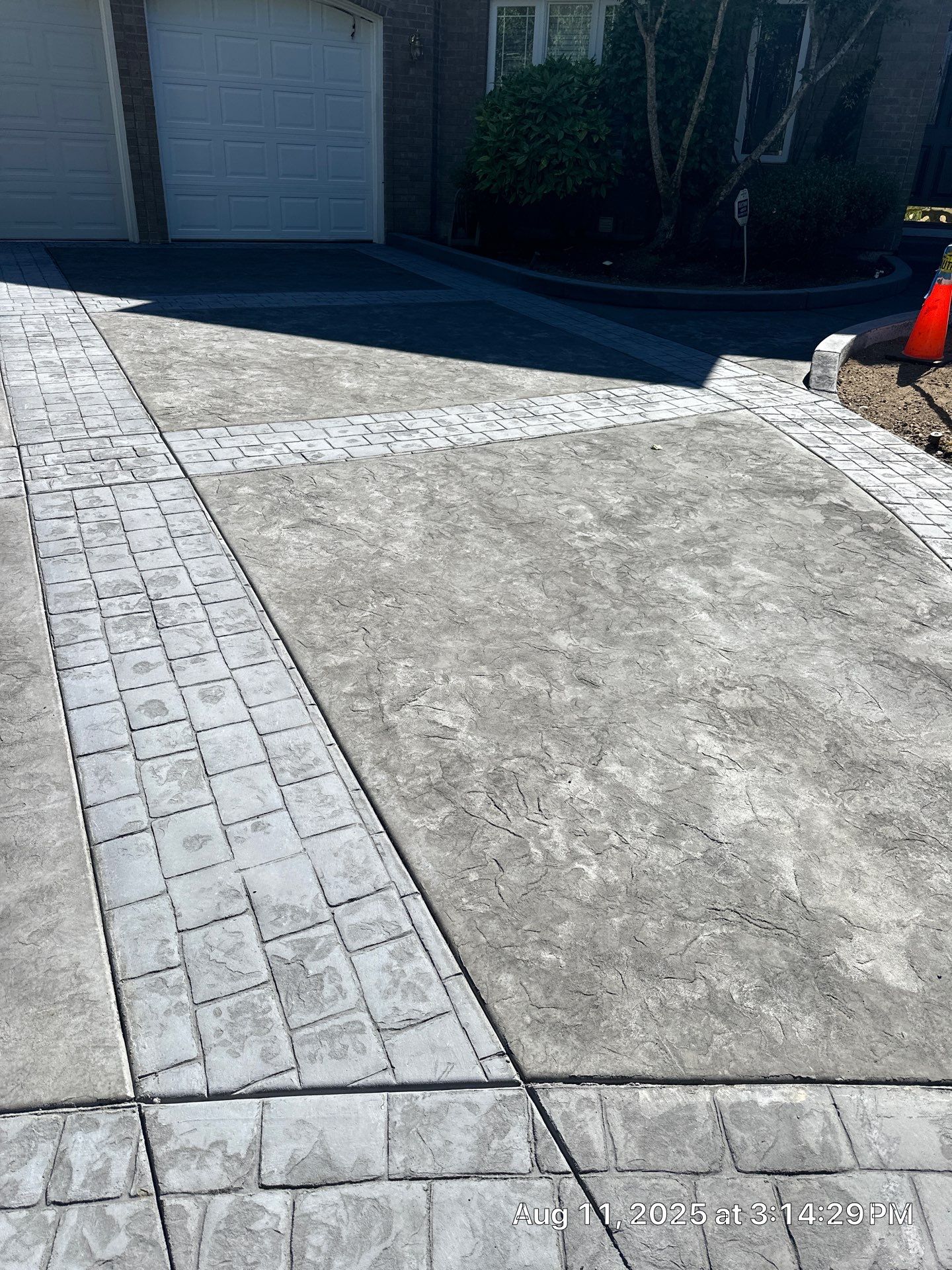 Multi-color Stamped & Sealed Concrete Driveway Renovation | Mukilteo by Jireh Asphalt & Concrete Inc