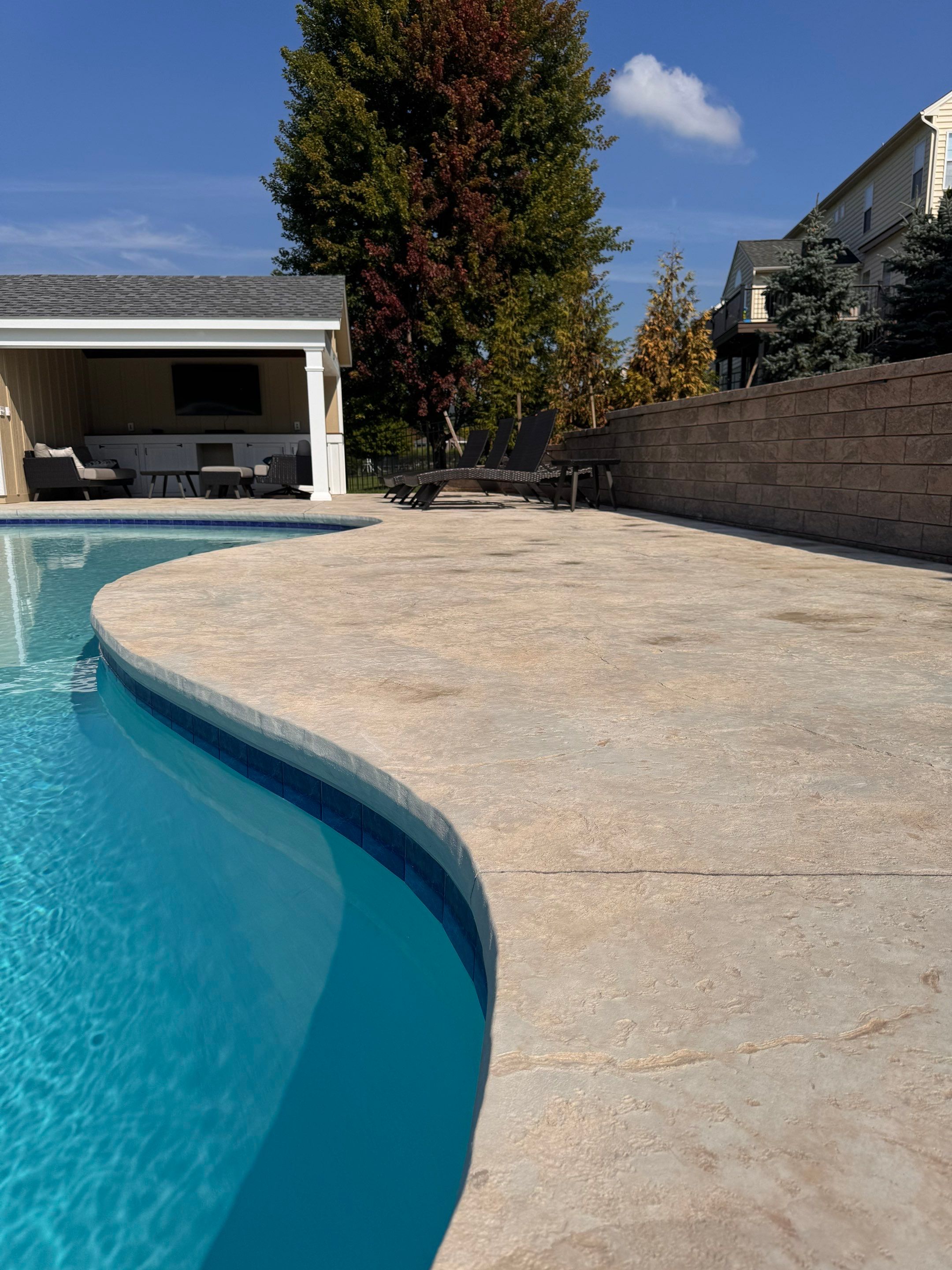 stamped concrete pool deck  by Architectural Concrete Design
