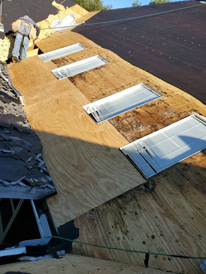Residential Roofing Installation using Roof Replacement by American Roofing & Construction LLC