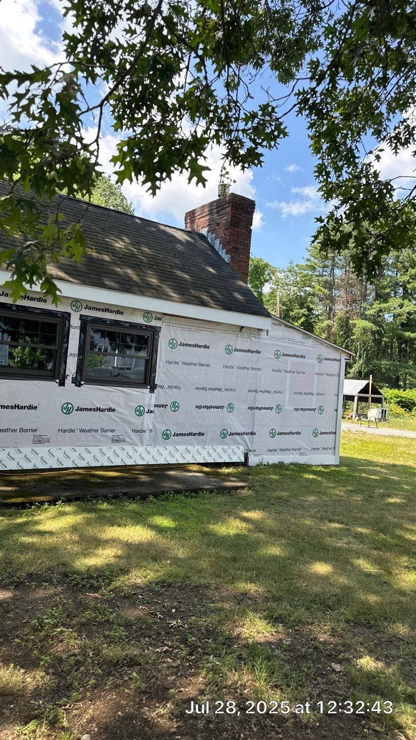 James Hardie Lap Siding Installation in Chelmsford, MA by Mighty Dog Roofing of Greater Middlesex County
