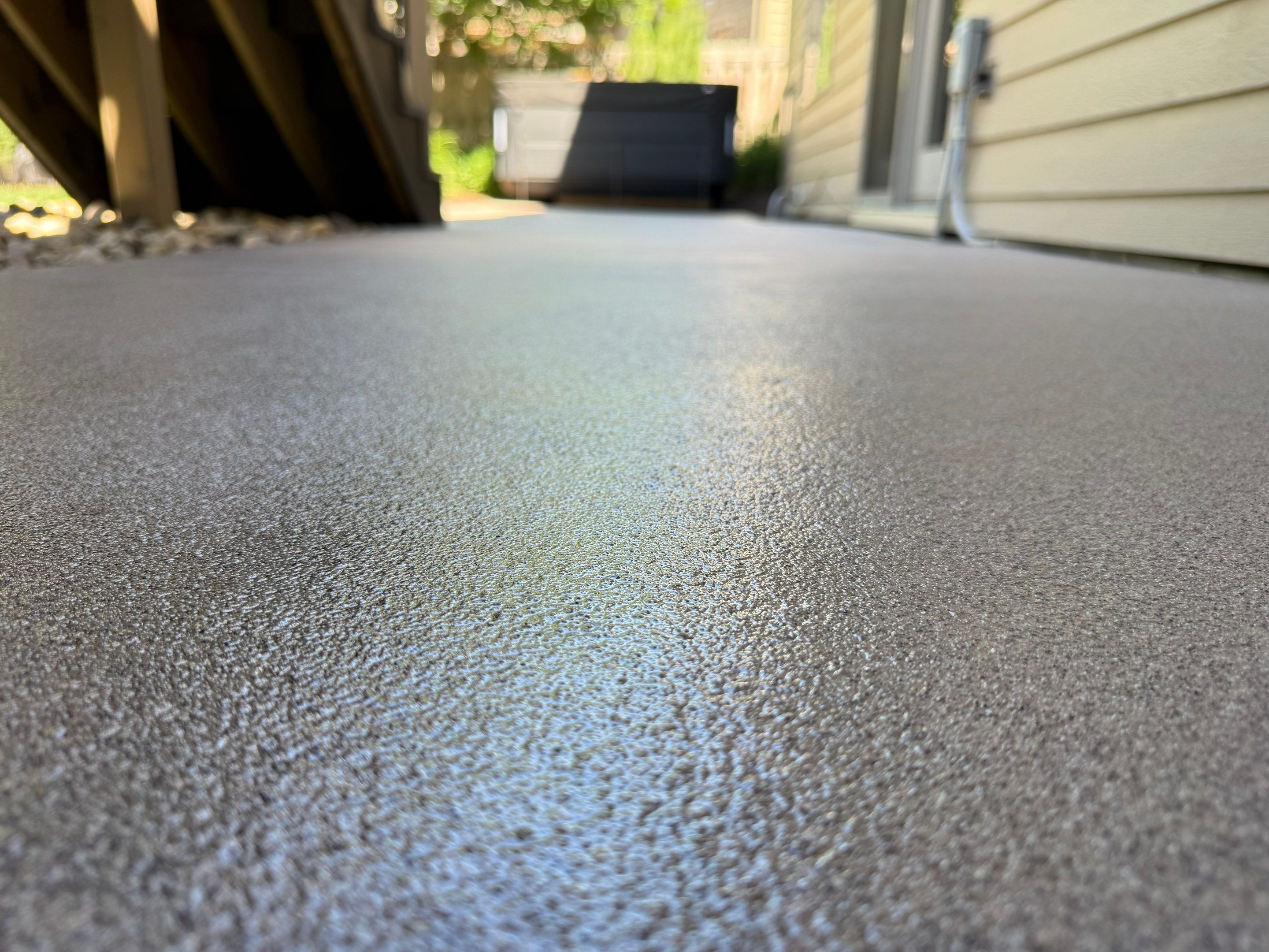 Textured Concrete Coating and Paver Patio Refresh in Sioux Falls by Select Painting, Coatings & Garage Cabinets