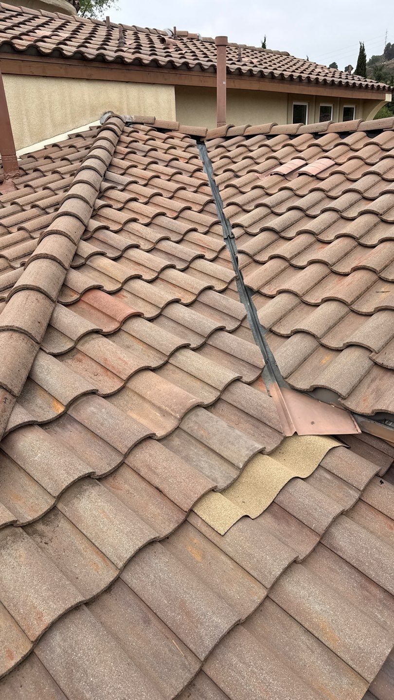 Terracotta Tile Roof Repair and Ridge Cap Sealing in Escondido by Reliable Roofing San Diego Inc.