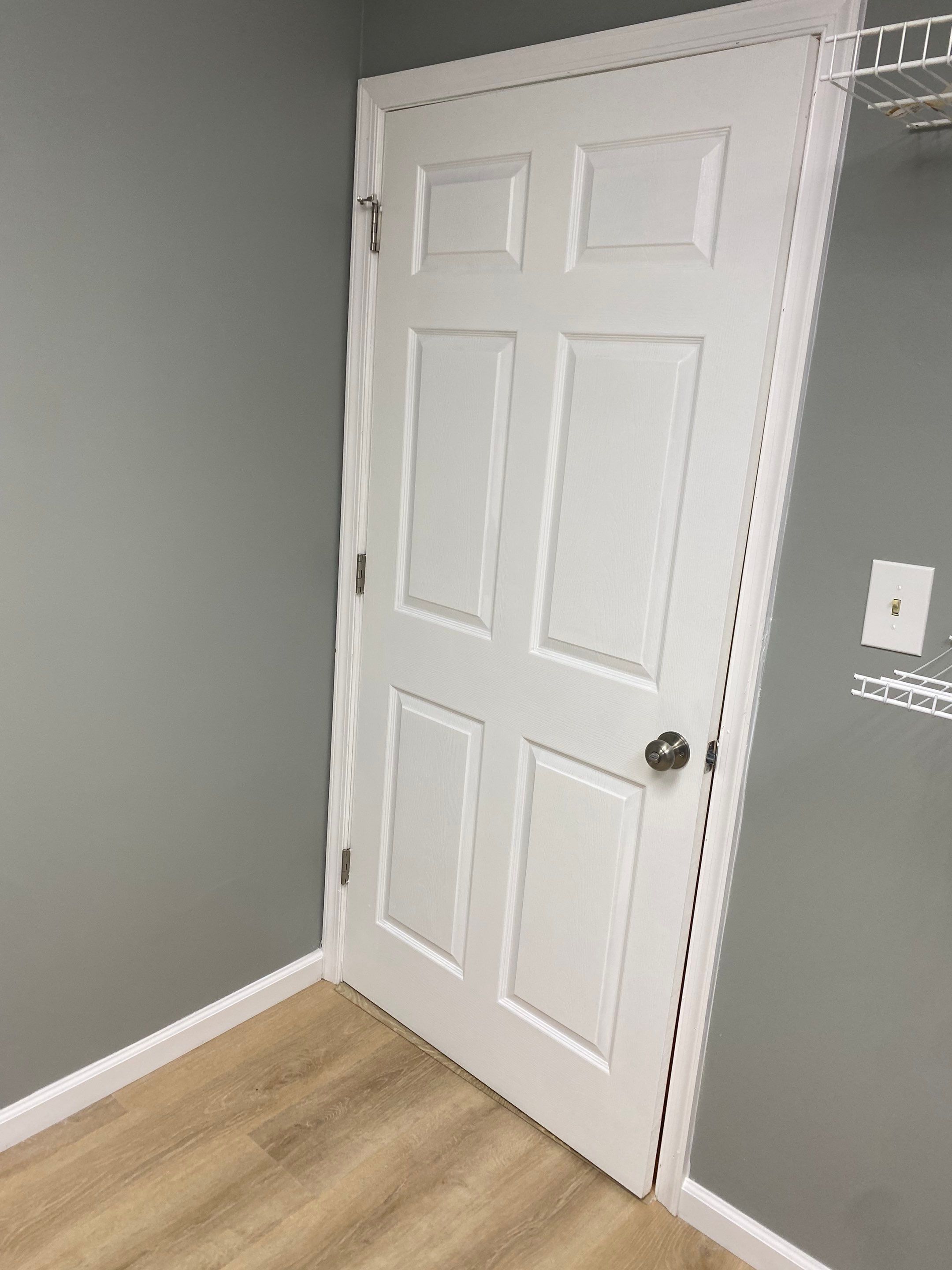 Laundry Room Redmodel using Lifeproof Luxury Vinyl Plank Flooring by The Smet Companies, LLC