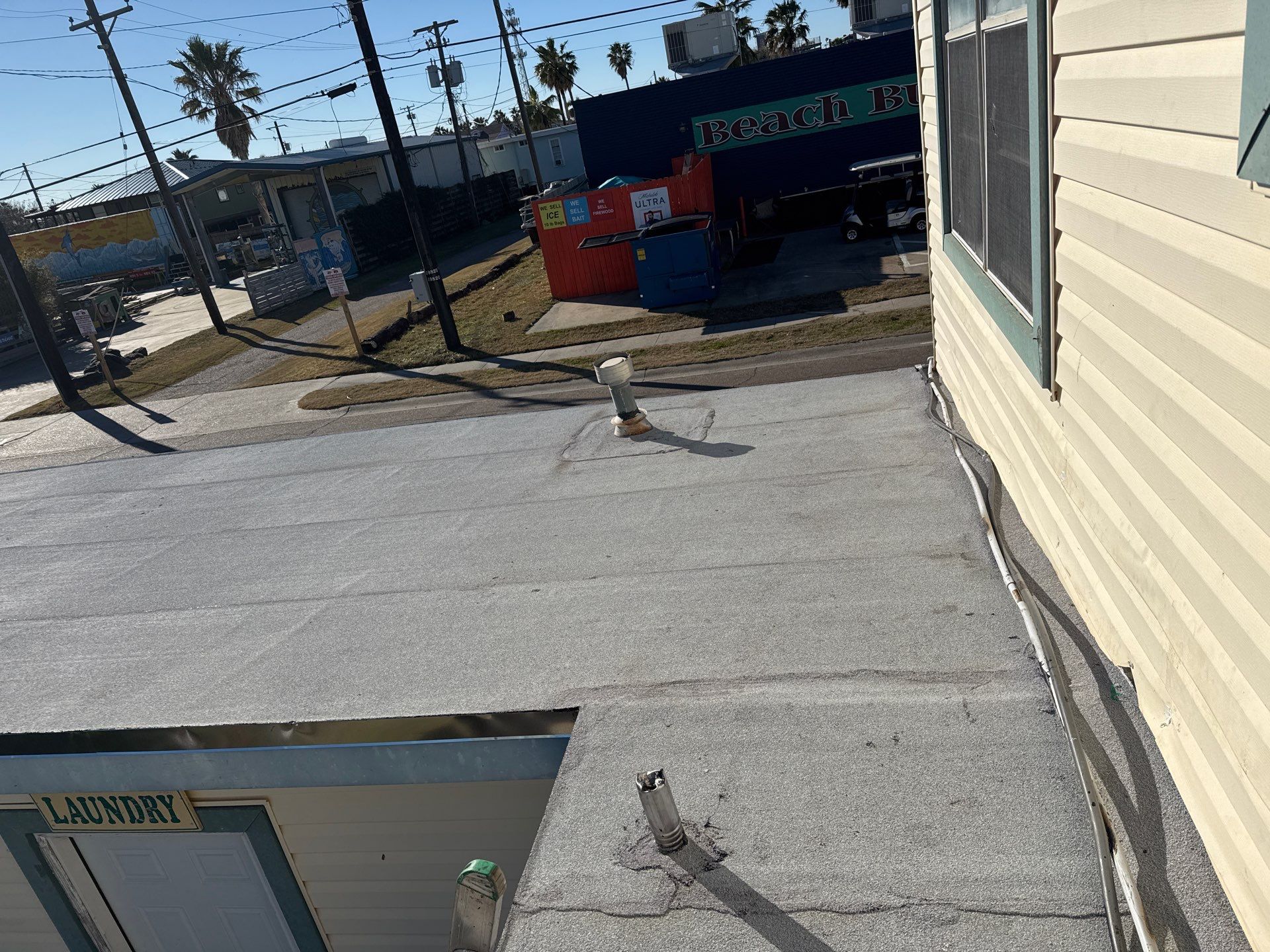 Mustang Island Flat Top by Bayfront Roofing and Construction
