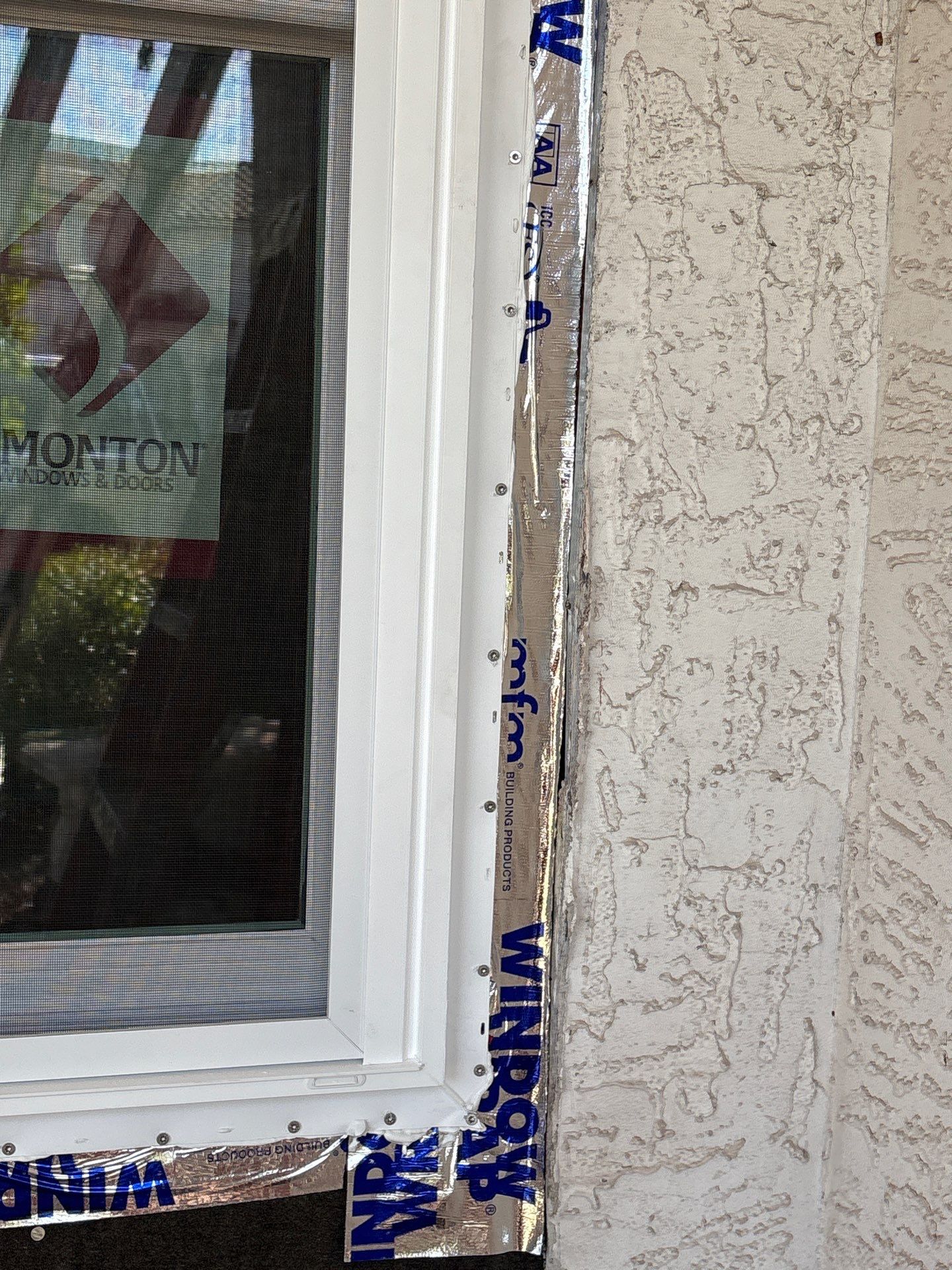 Installing Windows on a Submarine  by Bayfront Roofing and Construction
