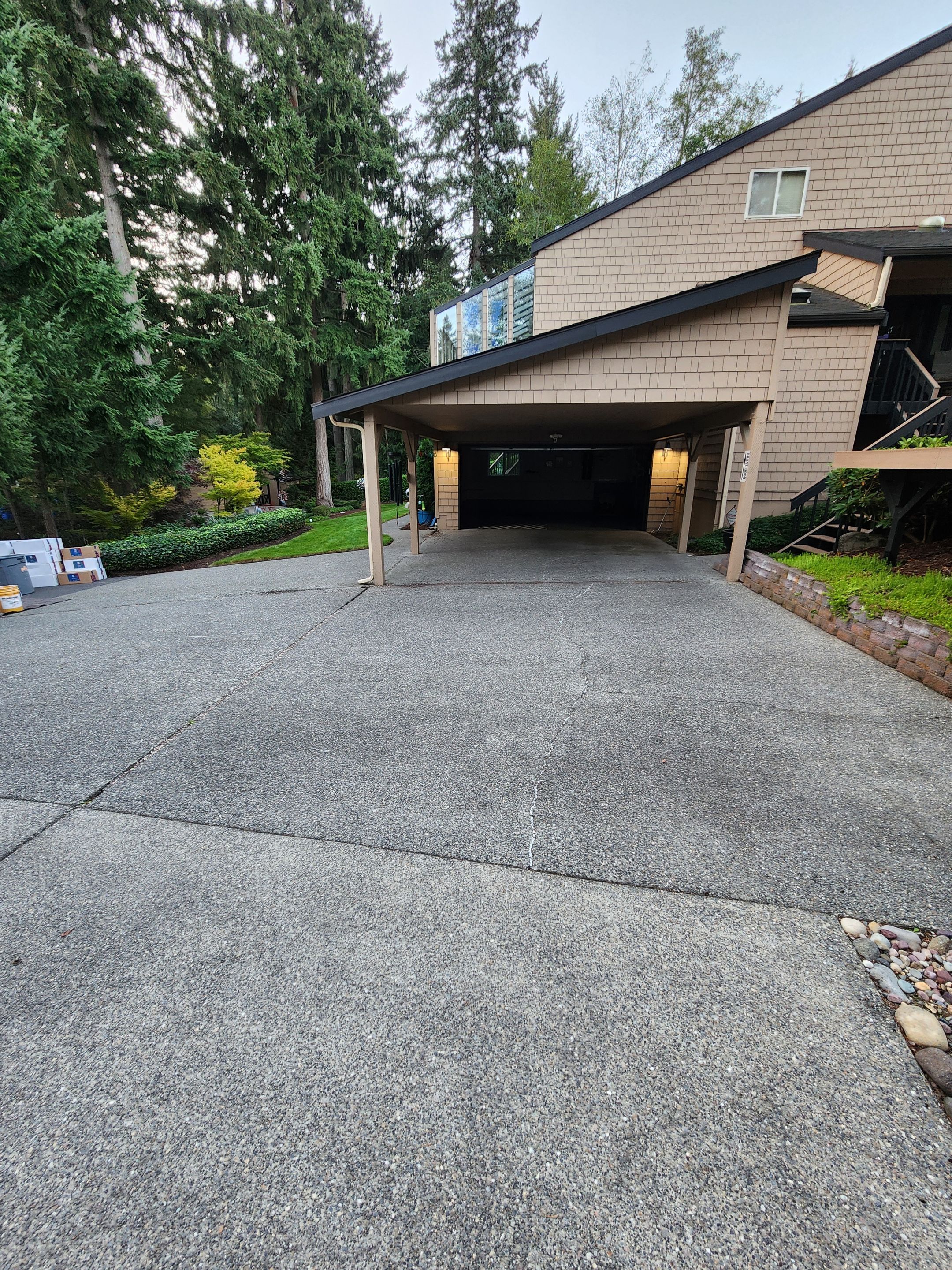 Walkway and driveway by Concrete Coating Experts Inc.
