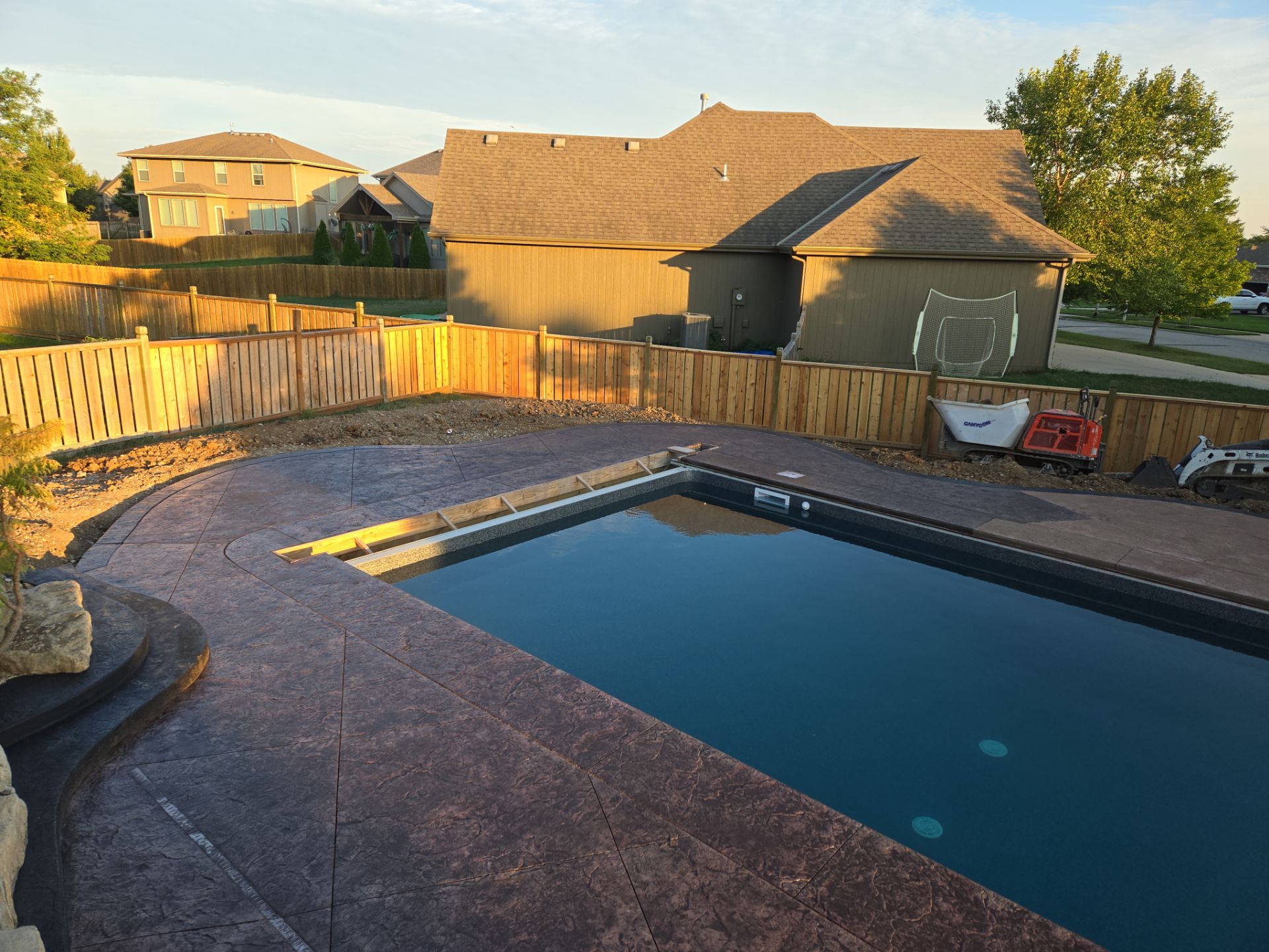 Back Yard Pool Patio by LAND ESCAPES LLC