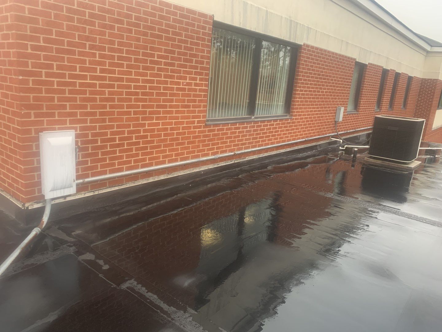 Re Roof (TPO) by American Roofing NC
