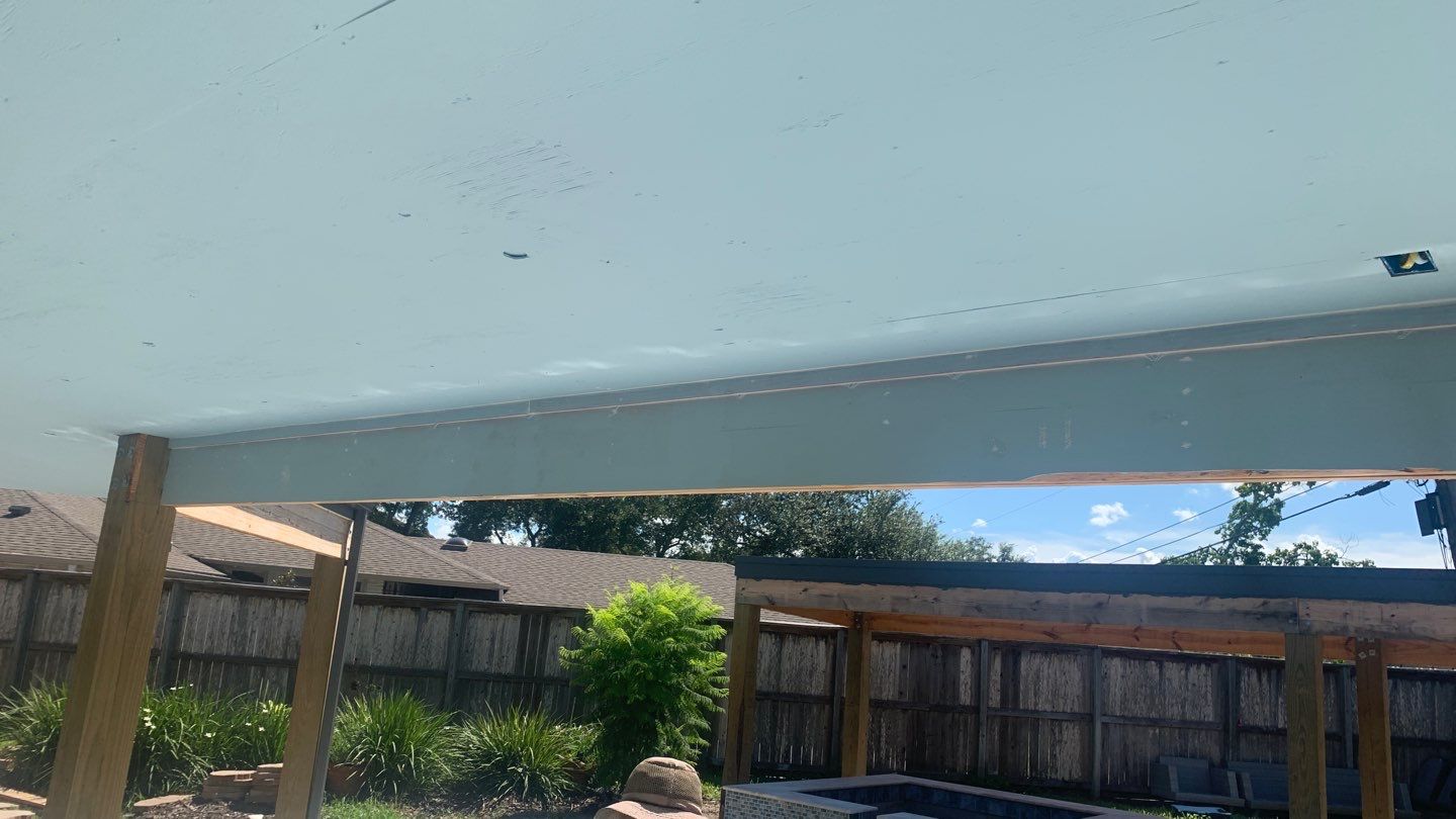 Beautiful pool side build by Bayfront Roofing and Construction