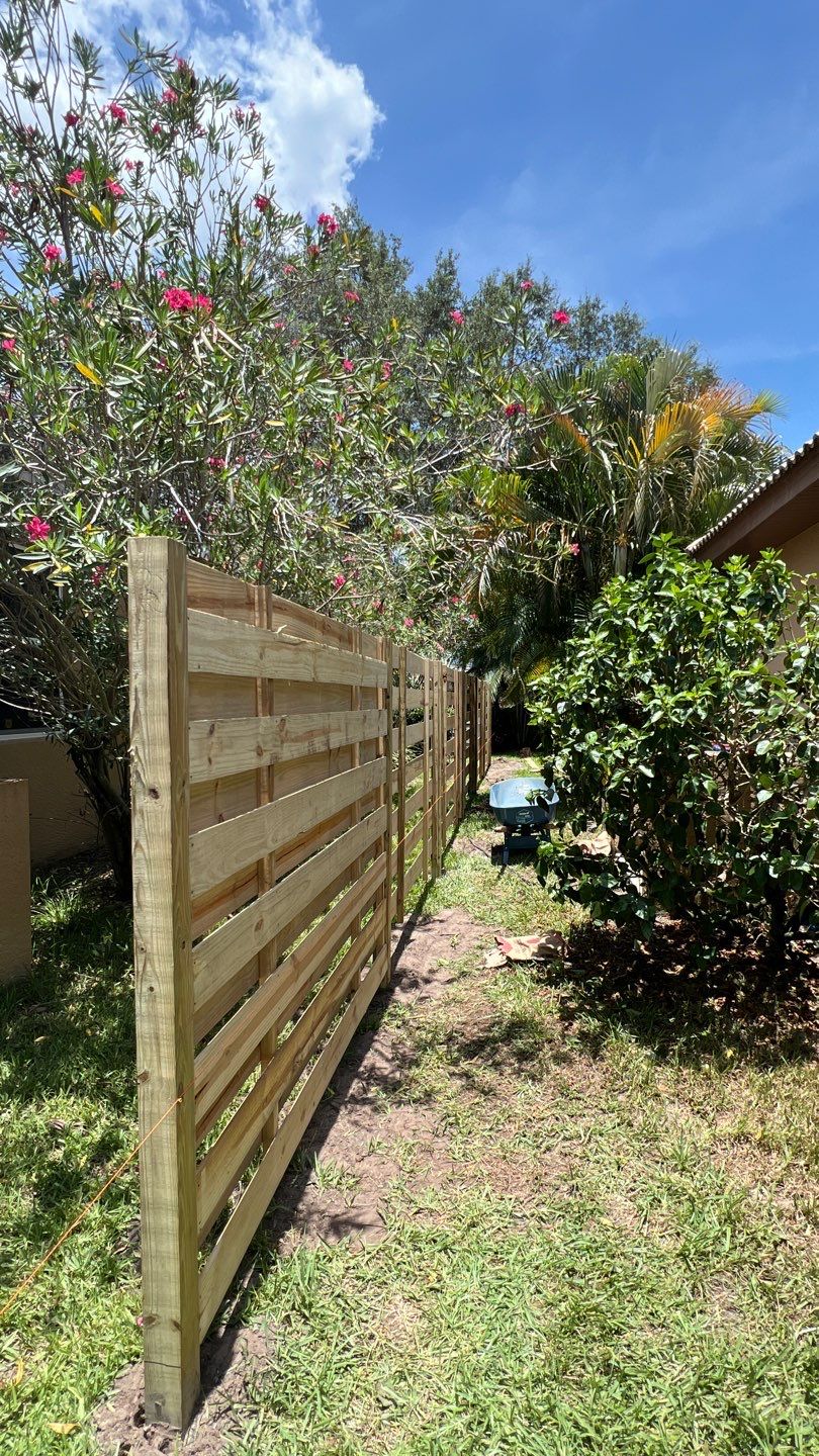 Osprey, FL 6ft. Tall Treated Horizontal Shadowbox Wood Fence by Asap fence and gates, LLC