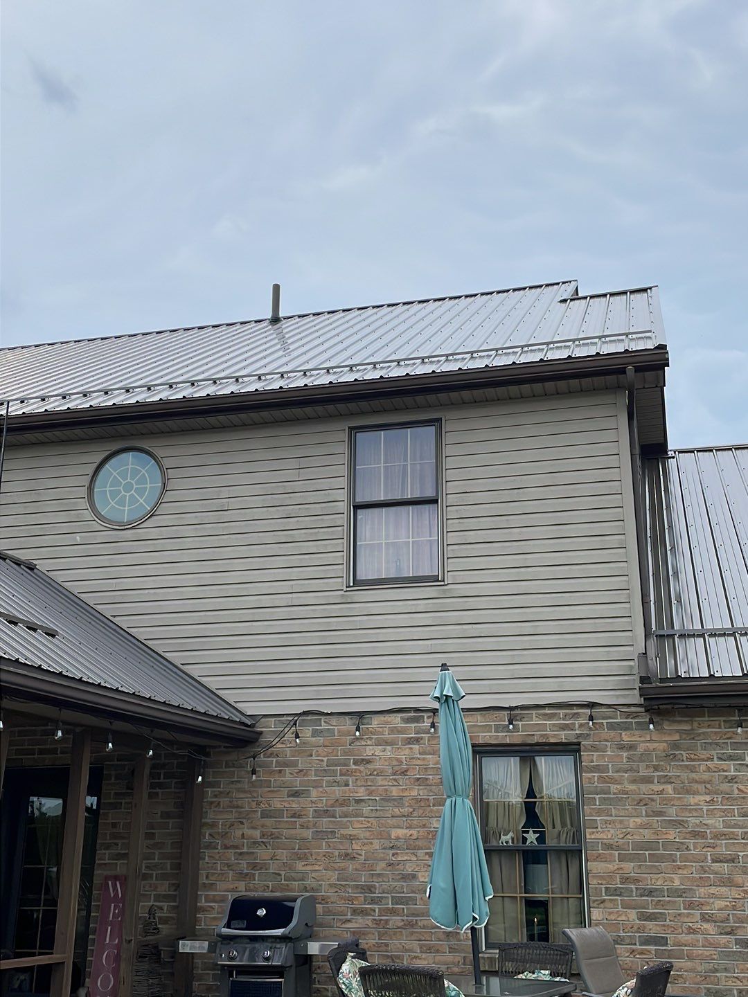 Residential Roofing Installation using Performance Panel Metal - Burnished Slate by RoofX 