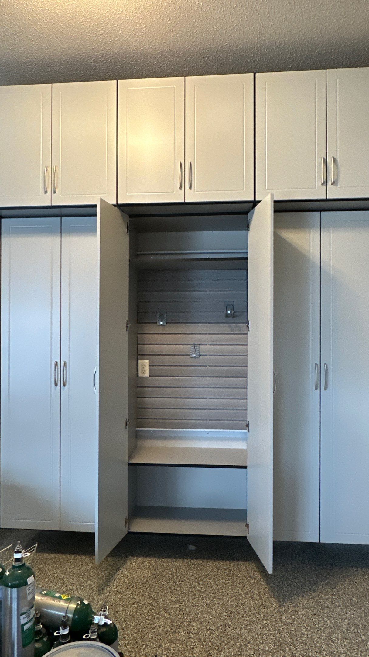 Erica G added cabinets that make all the difference by Banner Garage