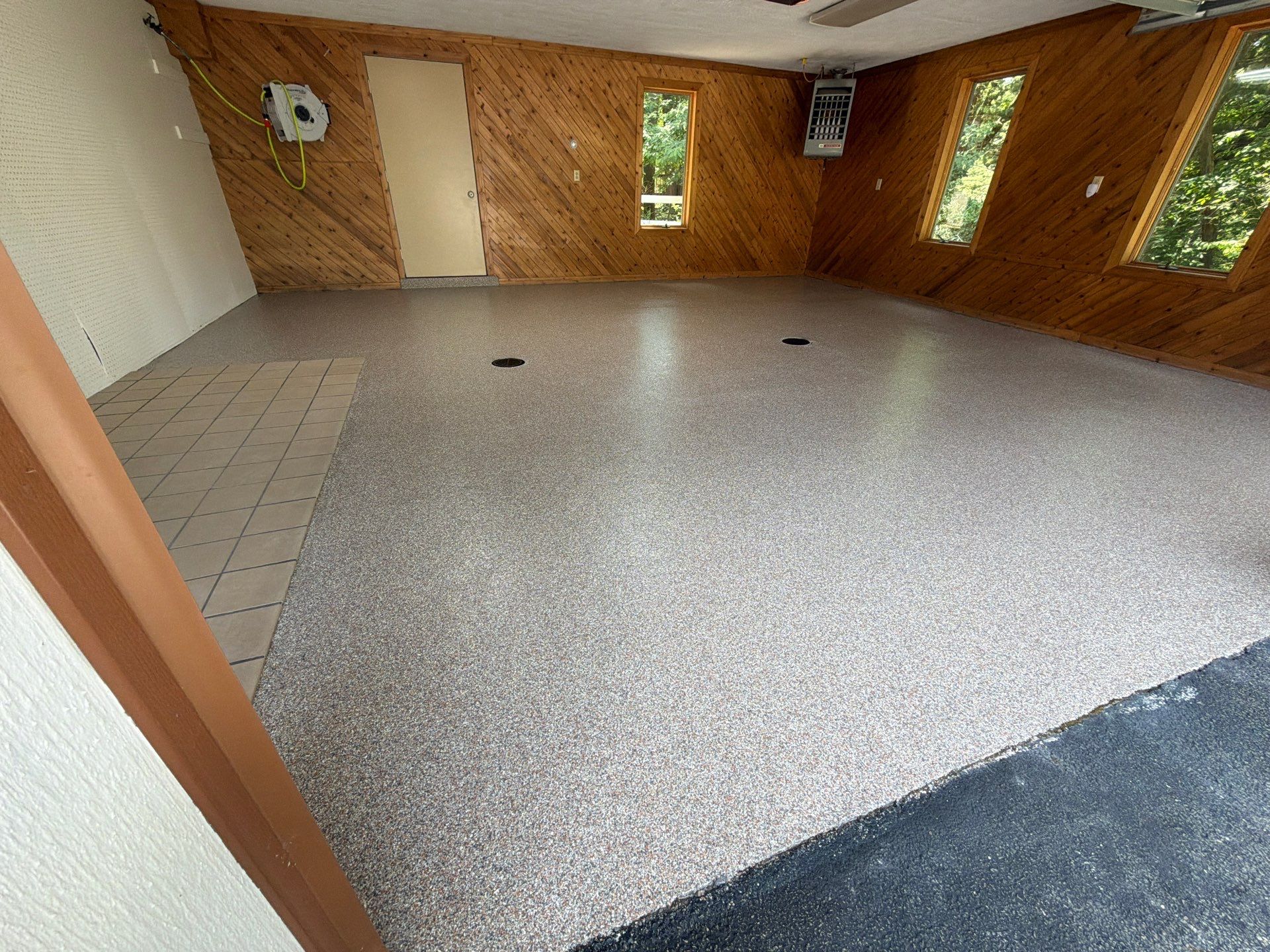 Grand Haven Garage Epoxy Floor Coating with Wax Wing Flake by Gordon Painting