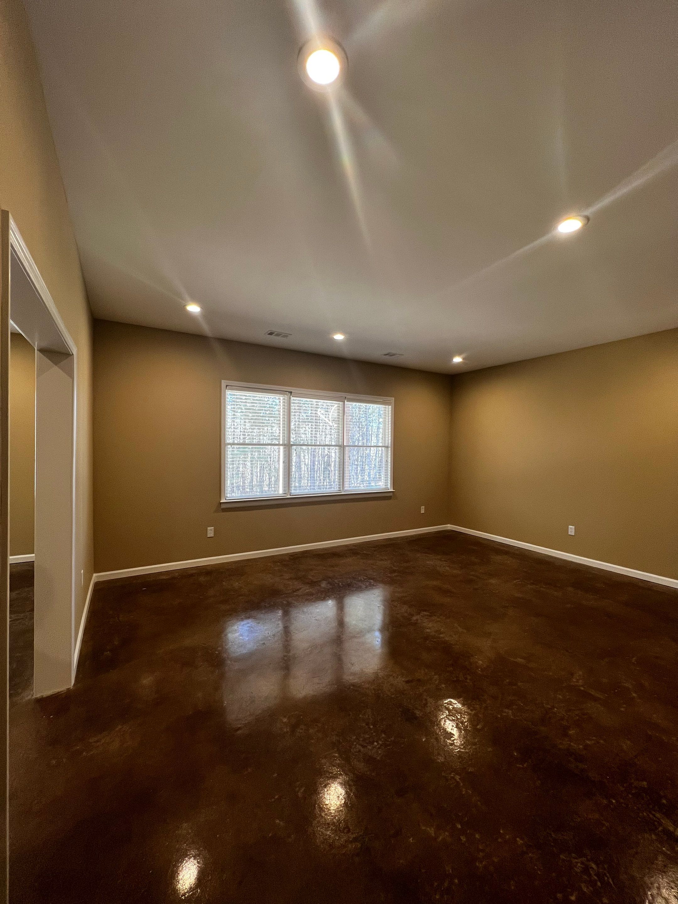 Finished Basement Renovation Featuring Polished Concrete in Atlanta by Swift Home Renovations