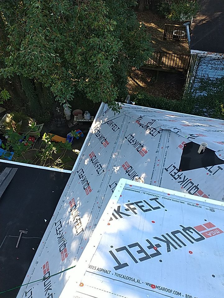 Residential Roofing Installation using Roof Replacement by American Roofing & Construction LLC