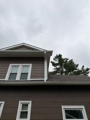 White Gutter and Downspout Installation in Boyne City