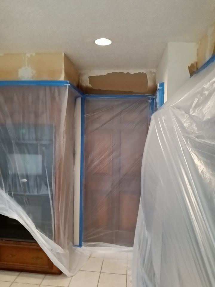 Interior and exterior painting project by Roof Concepts Construction