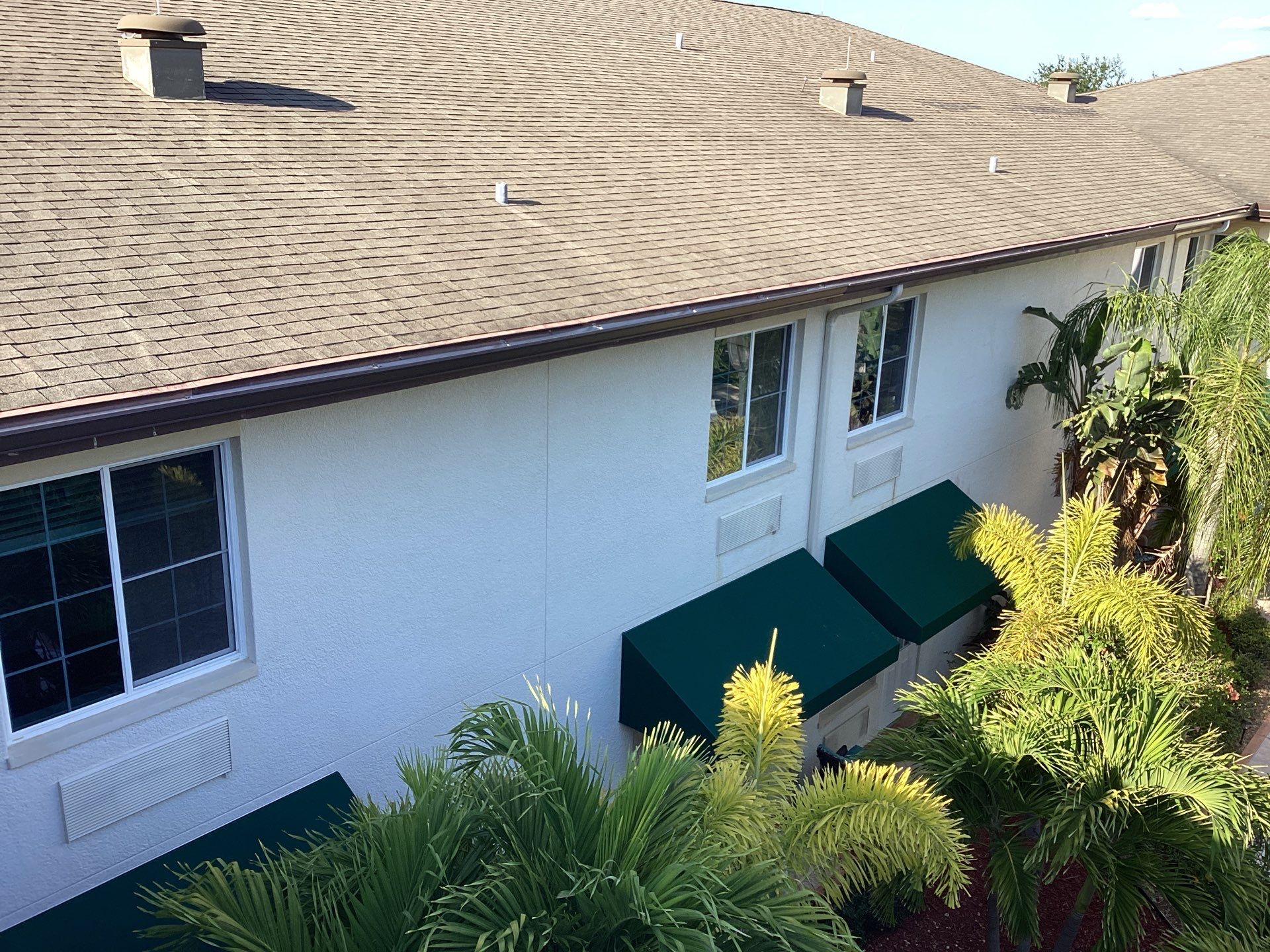 Musket Brown Seamless Gutters using Musket Brown Seamless Gutters in Capen Coral FL by Gutter Professors