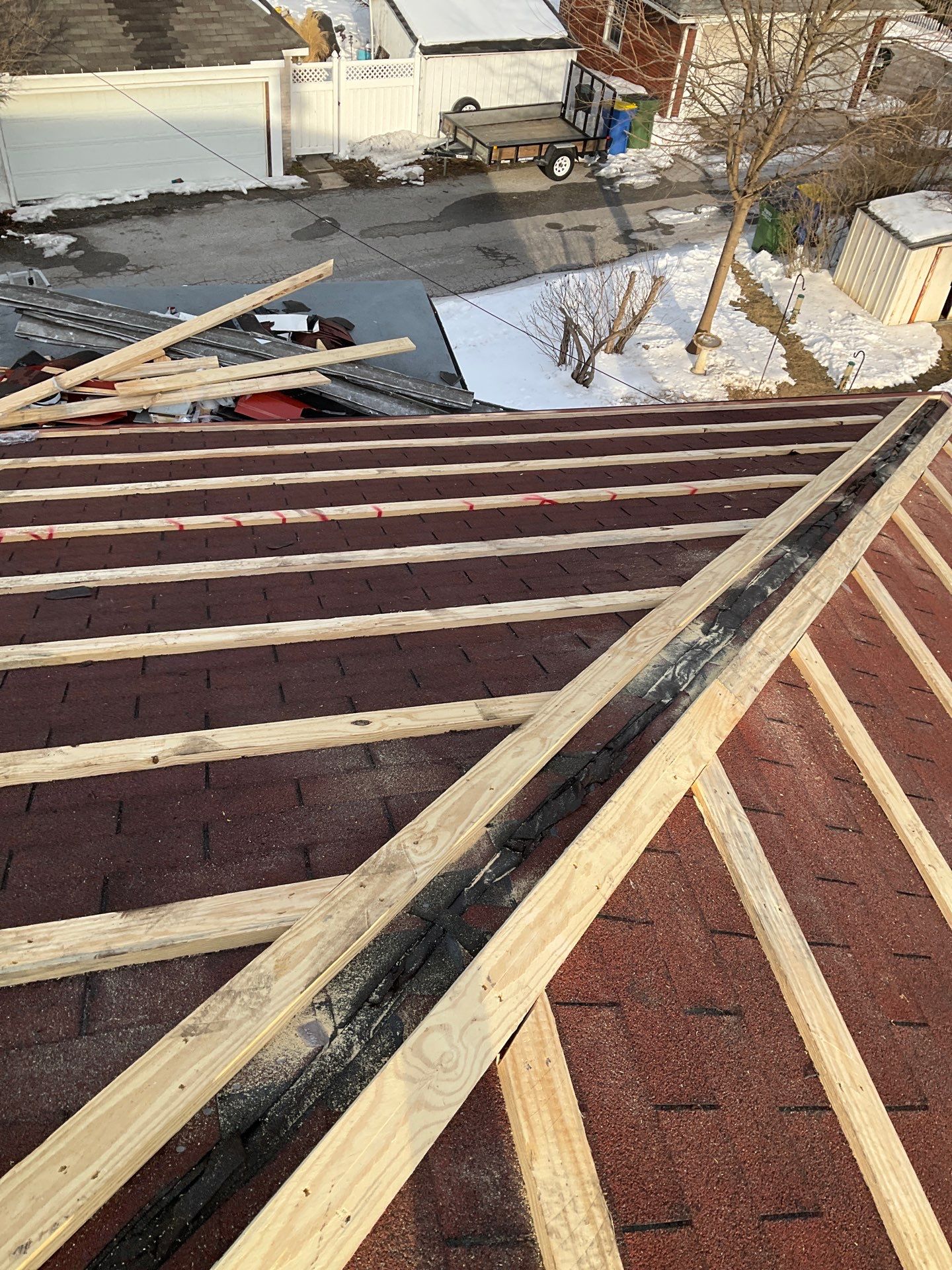 Red Metal Roofing Upgrade for Brick Home by Esh Builders