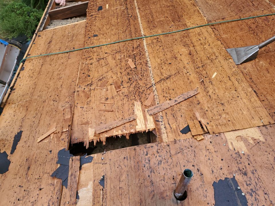 Residential Roofing Installation using Roof Replacement by American Roofing & Construction LLC